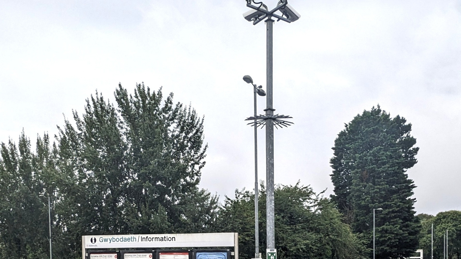 High-resolution close-up of an outdoor municipal CCTV surveillance camera dome.