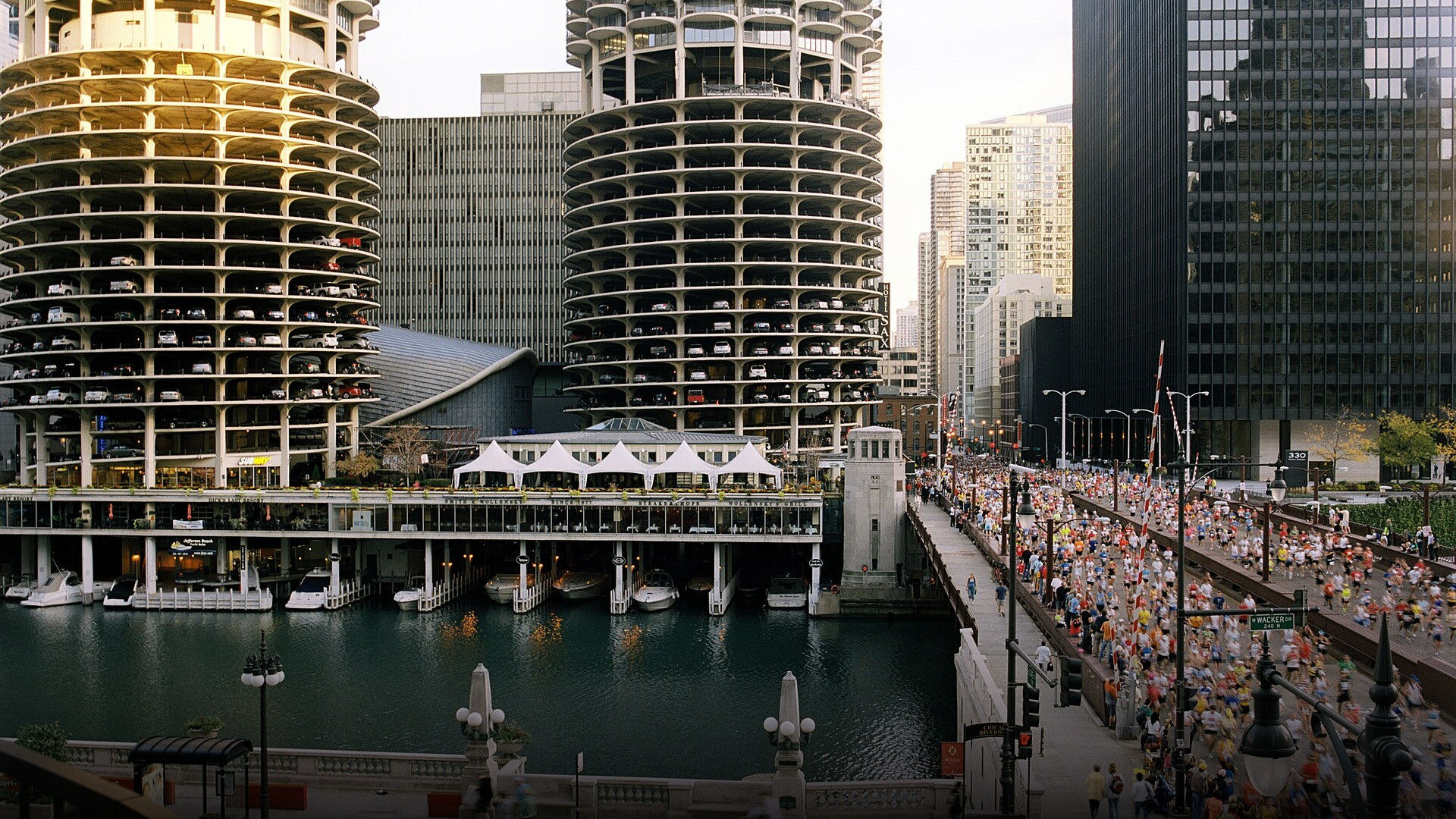 The Chicago River reflecting the architectural twin corn-cob towers of Marina City.