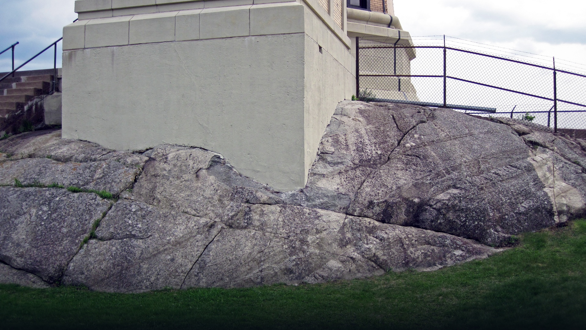 Massive white crystalline anorthosite rock formation.