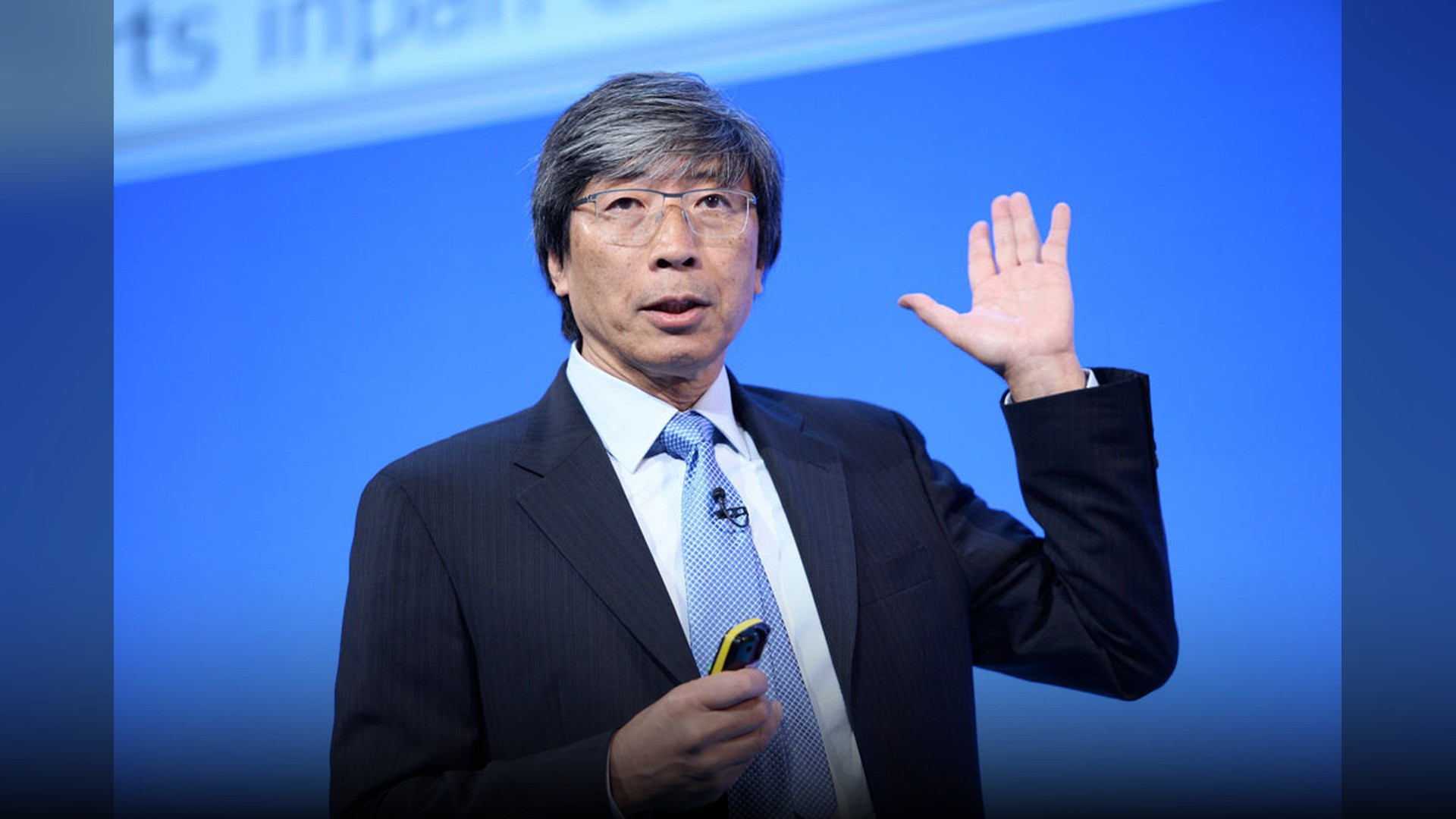 Dr. Patrick Soon-Shiong presenting medical research.