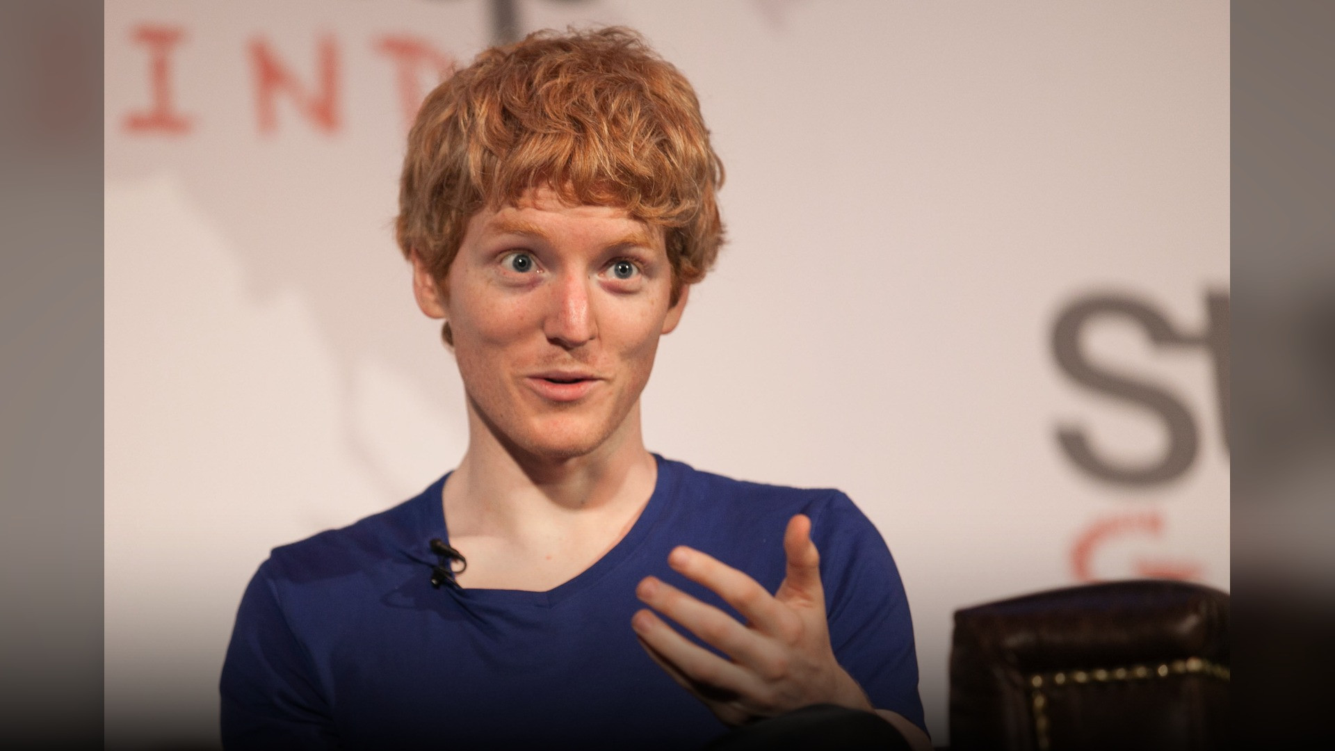 Patrick Collison smiling in a technology interview.