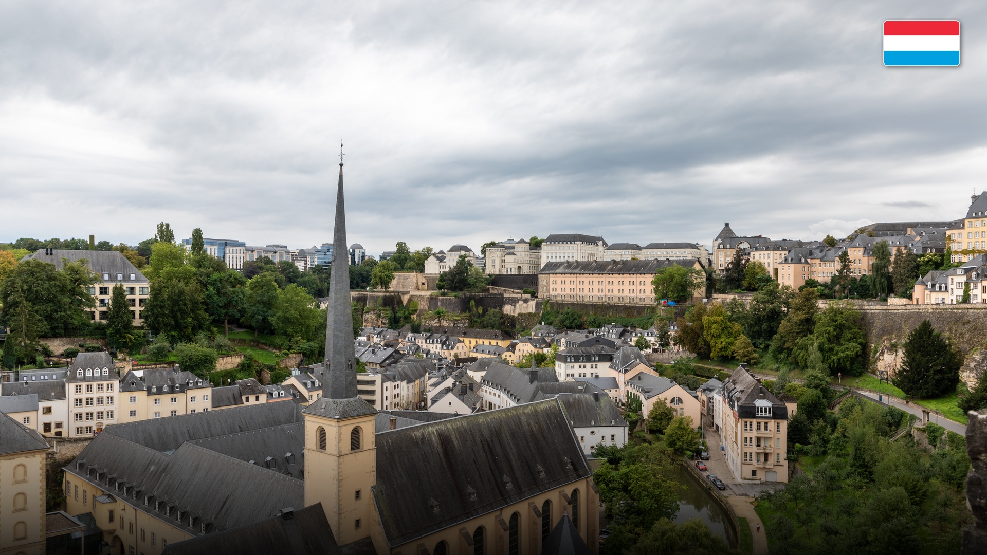 Scenic view of the Grund historic quarter with Neumunster Abbey along the Alzette river valley.