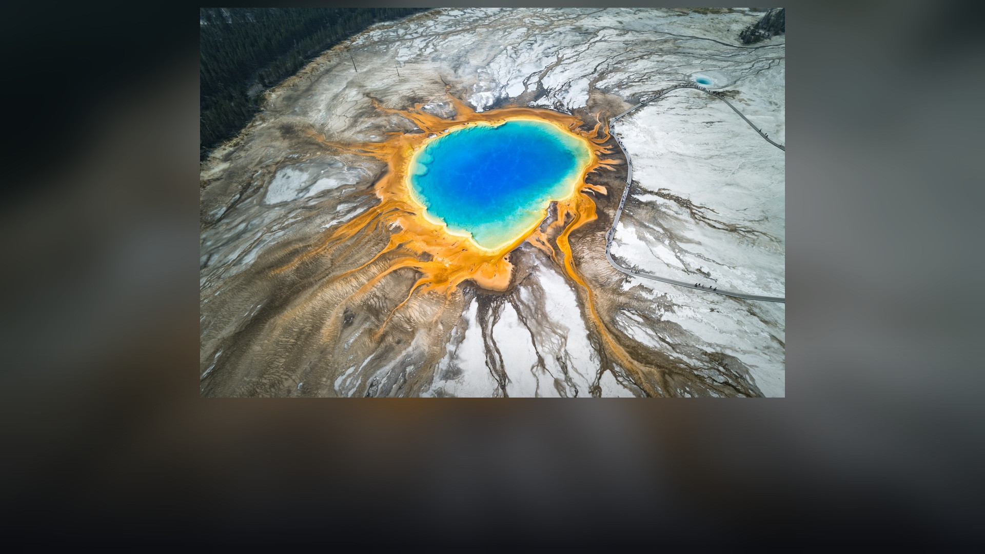 Panoramic landscape vista of Yellowstone National Park showing natural geological formations, terrain, and wilderness.