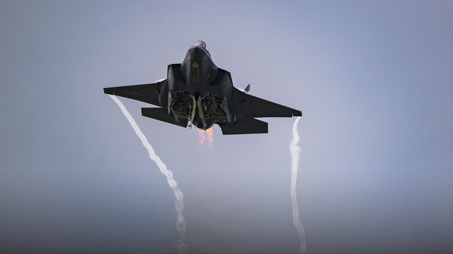 U.S. Air Force F-35A Lightning II stealth multirole fighter executing a high-speed bank.