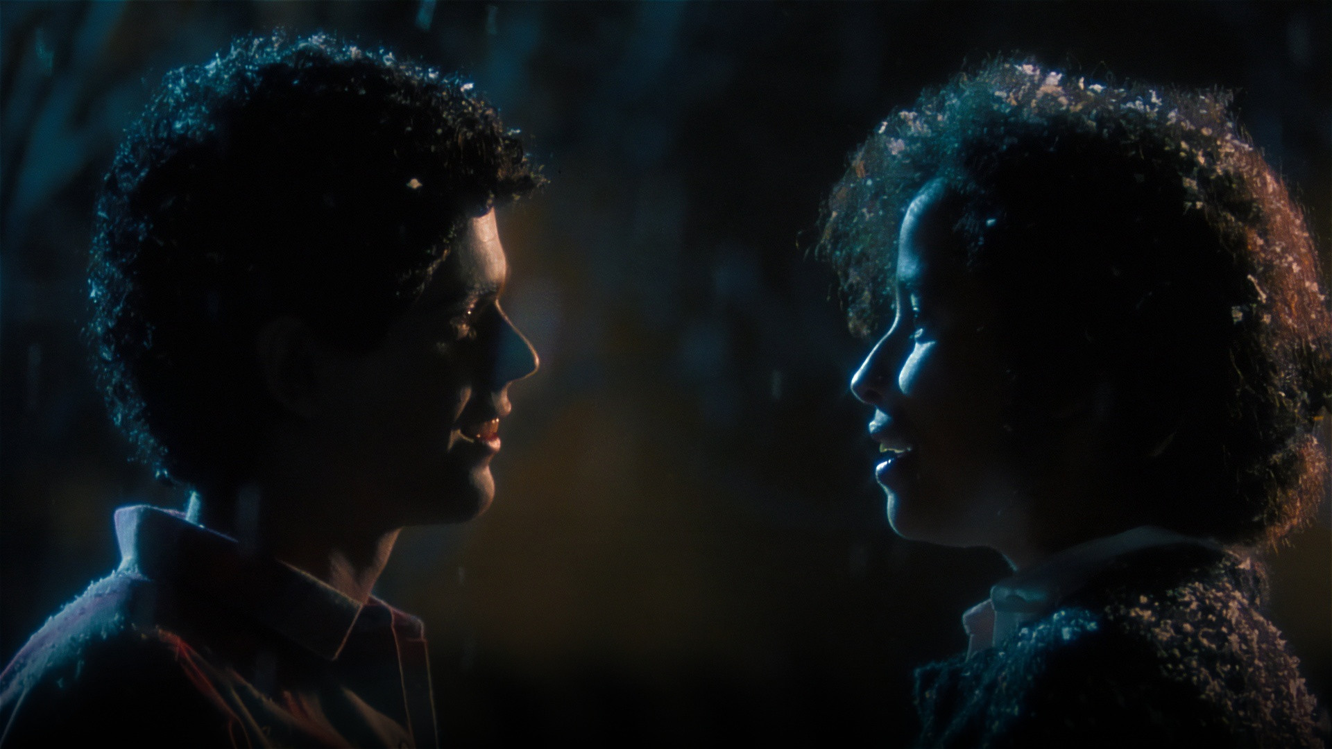 C. Thomas Howell as Mark Watson wearing sunglasses alongside Rae Dawn Chong in the campus comedy Soul Man.