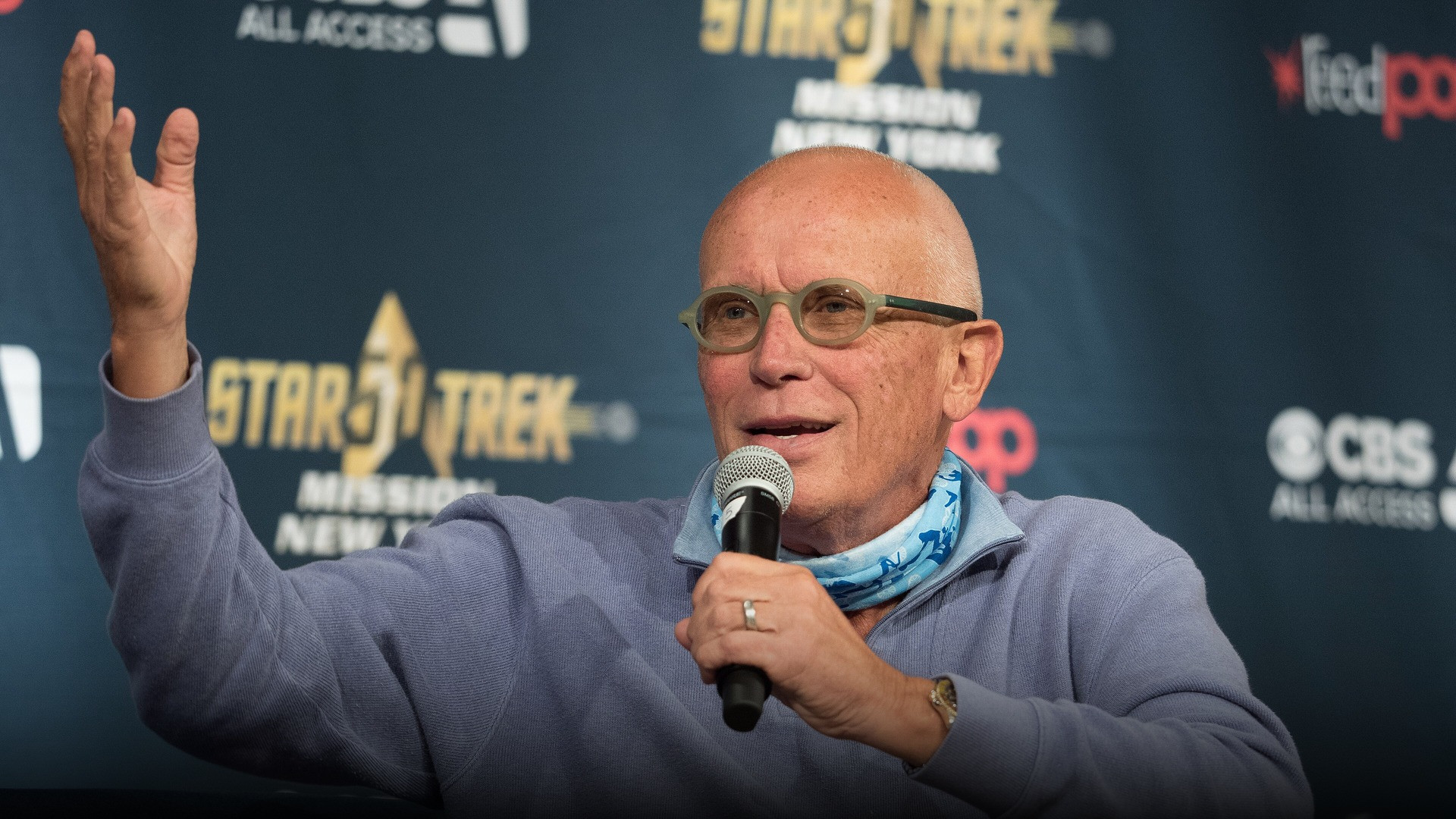 High-resolution portrait photograph of Peter Weller celebrating academic achievement.