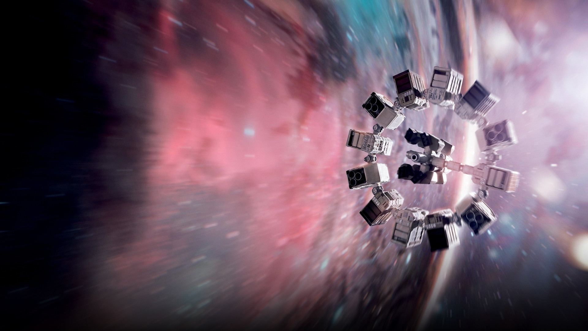 The Endurance modular spacecraft ring spinning through gravitational distortion near the wormhole in Interstellar.