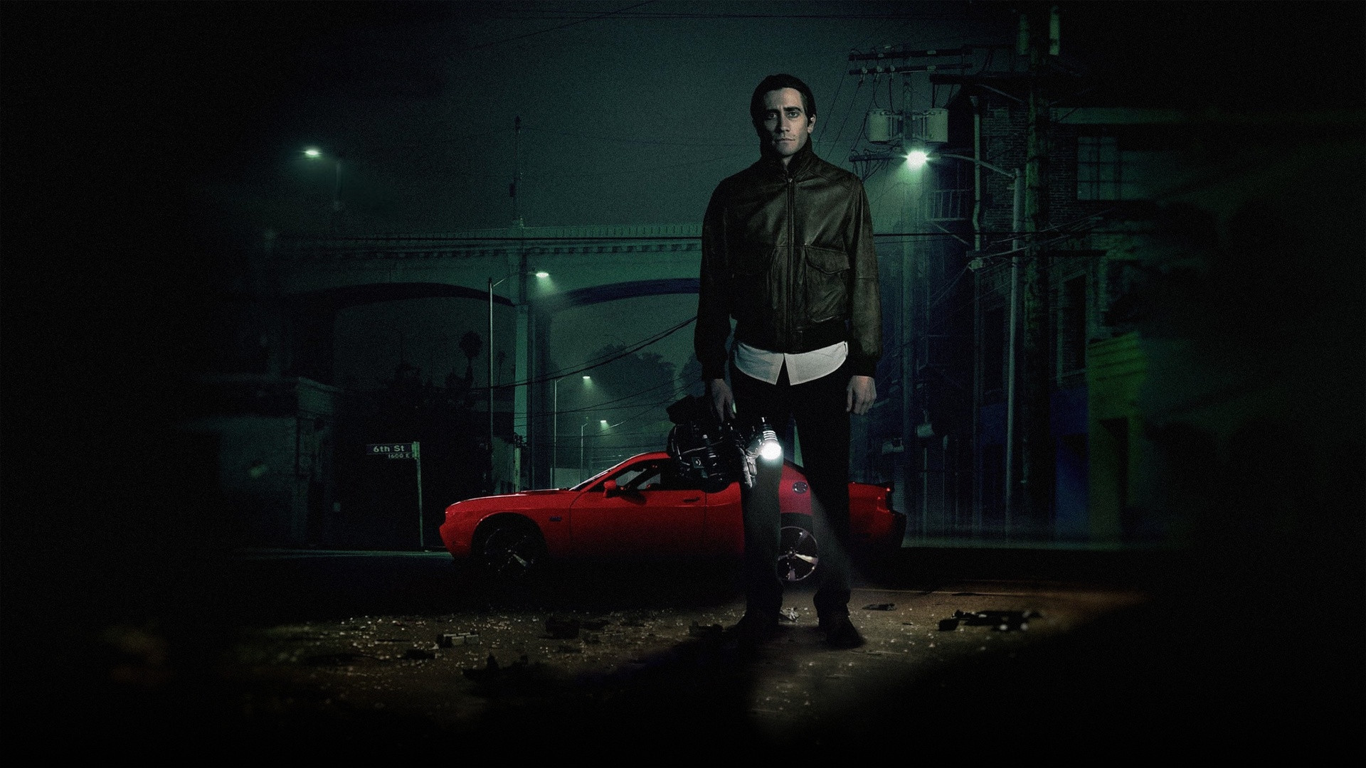 Jake Gyllenhaal looking gaunt with sunken eyes as Lou Bloom in Nightcrawler.
