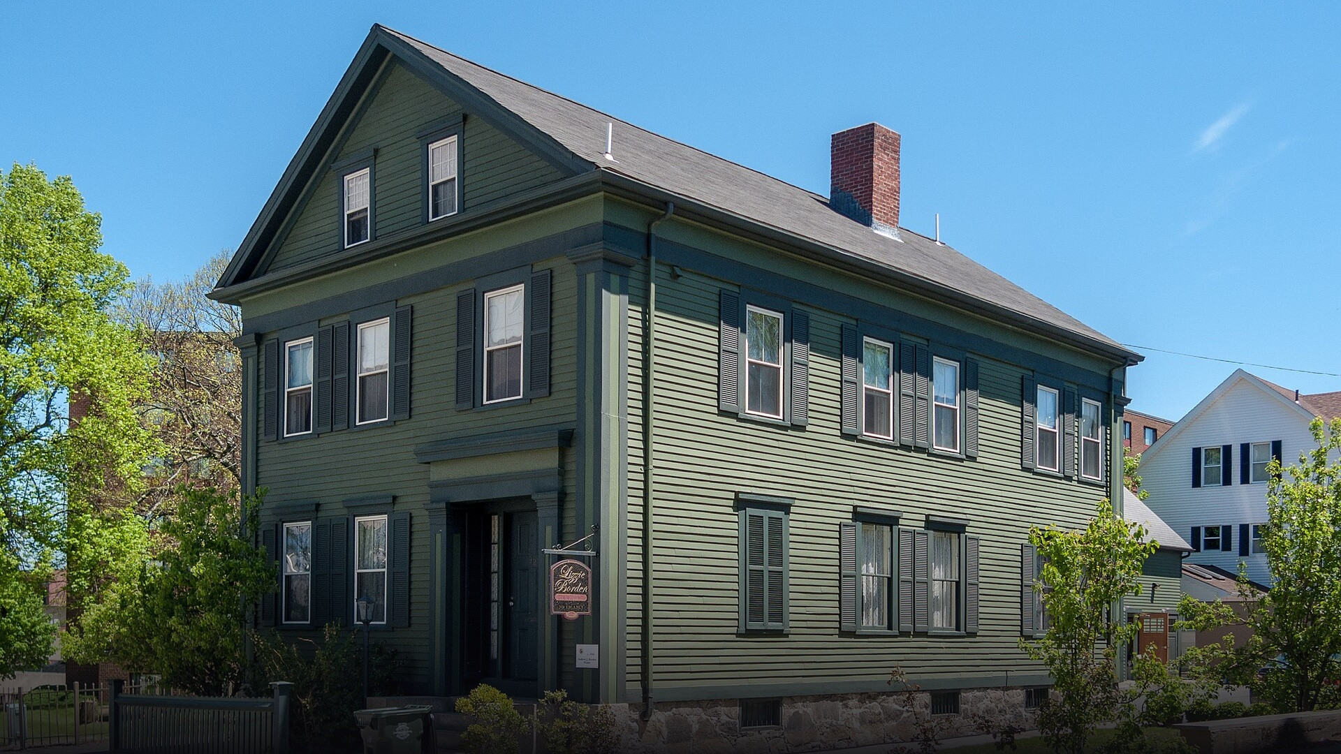 Exterior view of the historic Victorian home and bed and breakfast sign at 92 Second Street in Fall River, Massachusetts.