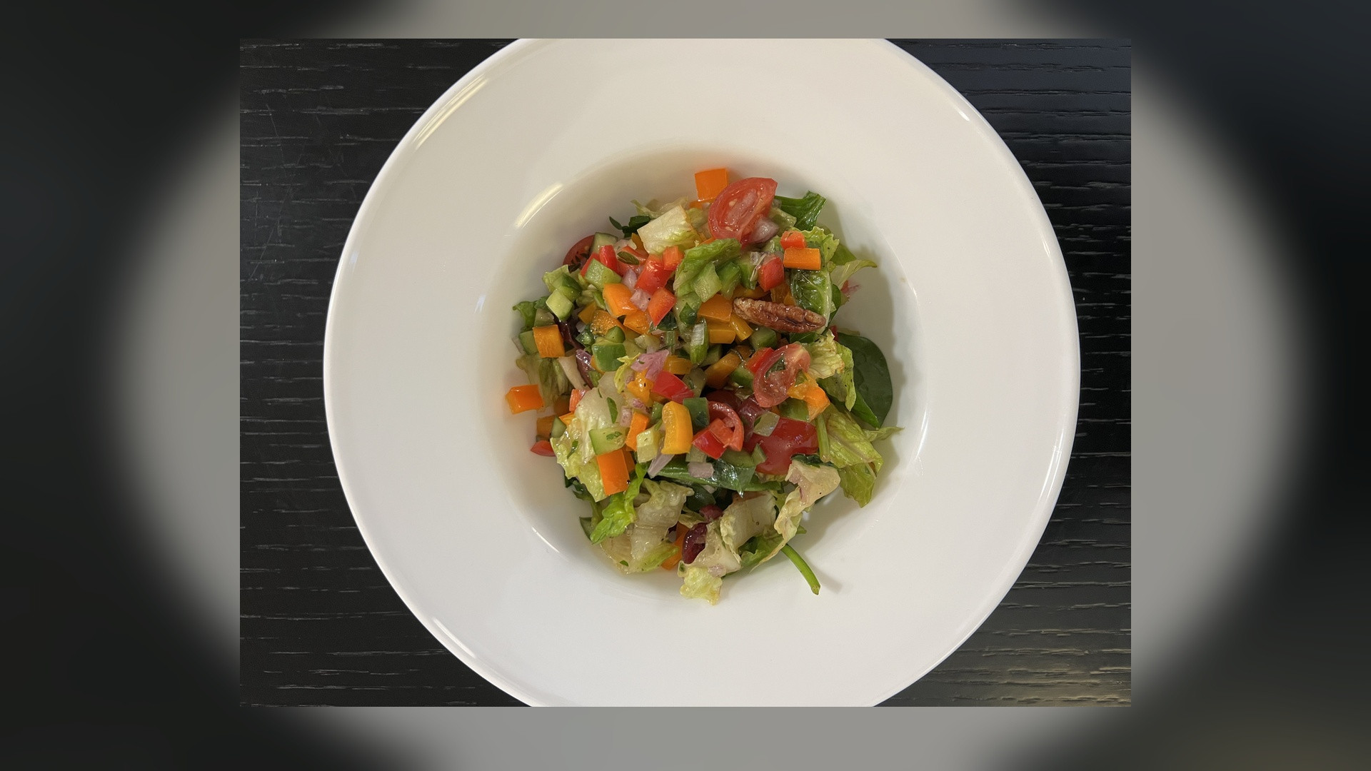 Fresh vibrant organic spinach, kale, and mixed leafy salad greens.