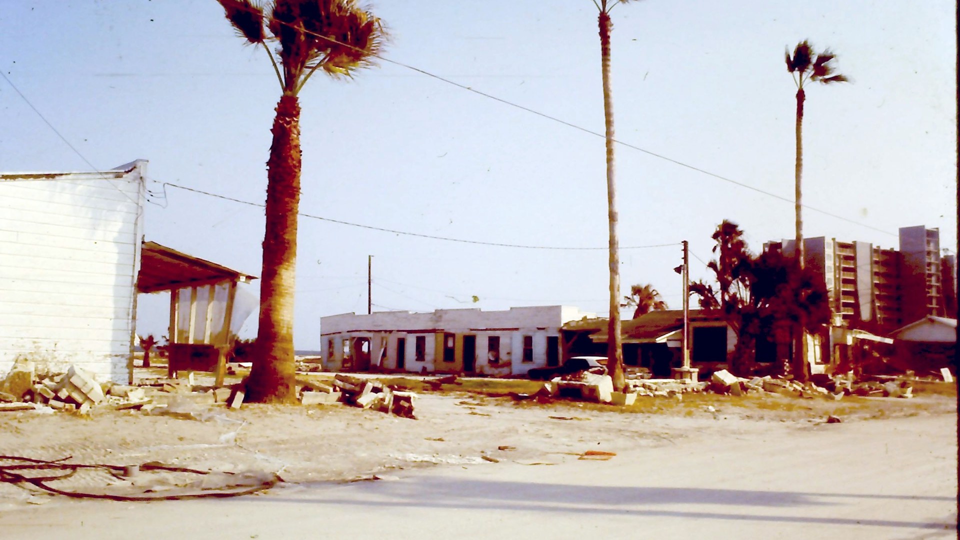 Archival photograph of coastal devastation along Corpus Christi Beach after Hurricane Allen in August 1980.
