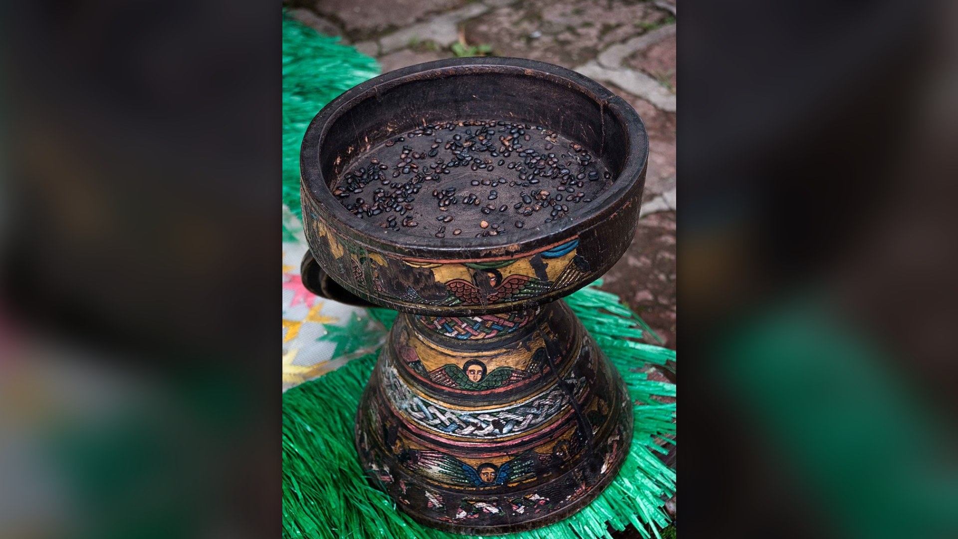 Close-up of freshly roasted Ethiopian coffee beans gleaming with rich oils