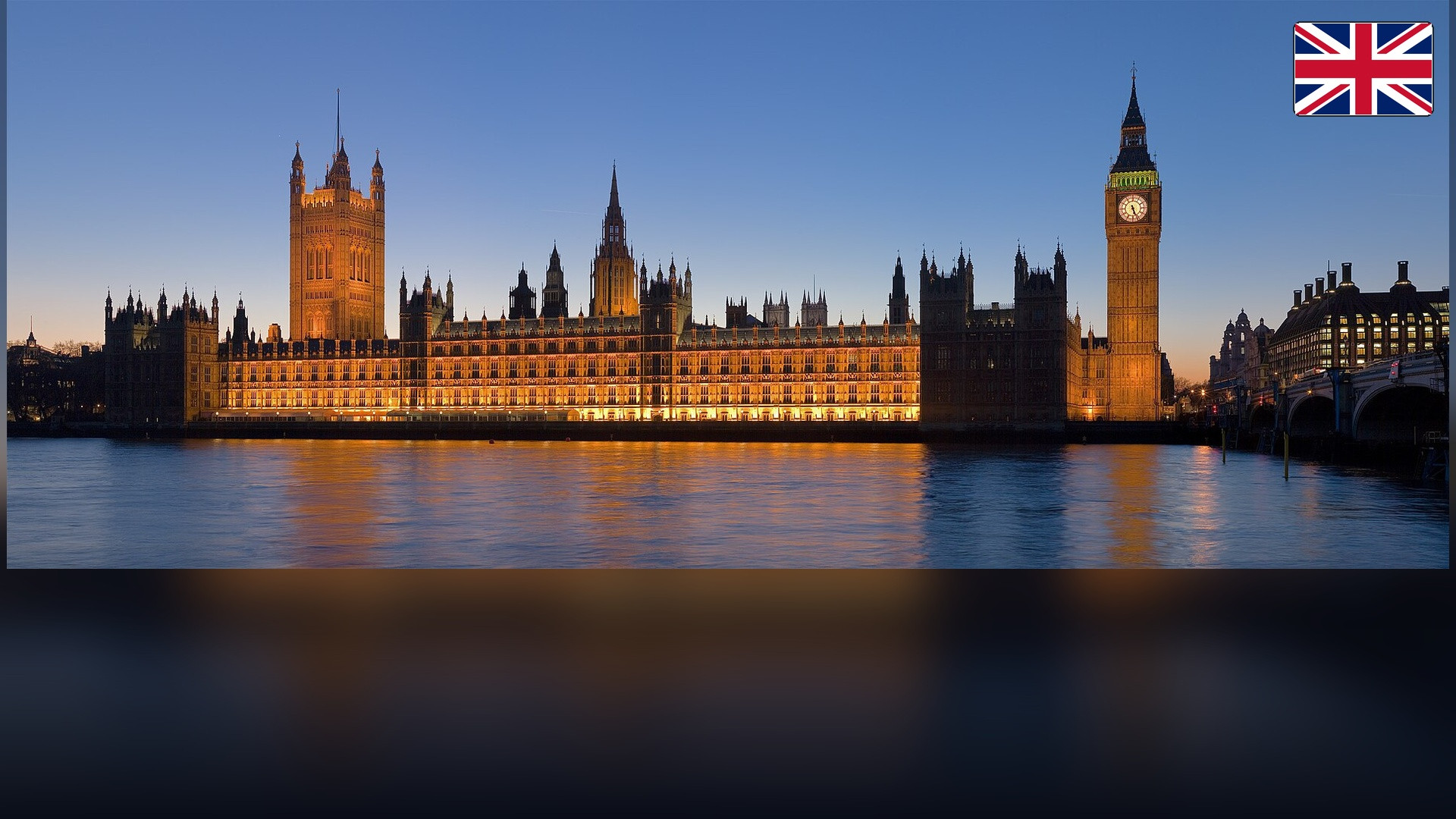 Palace of Westminster and Big Ben in London with the UK flag in the top right corner.