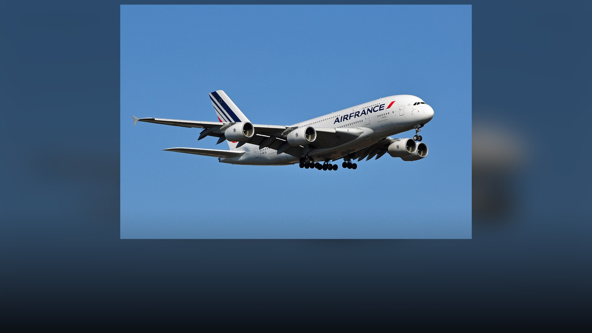 Air France Airbus A380-861 in official livery on runway under clear blue skies.
