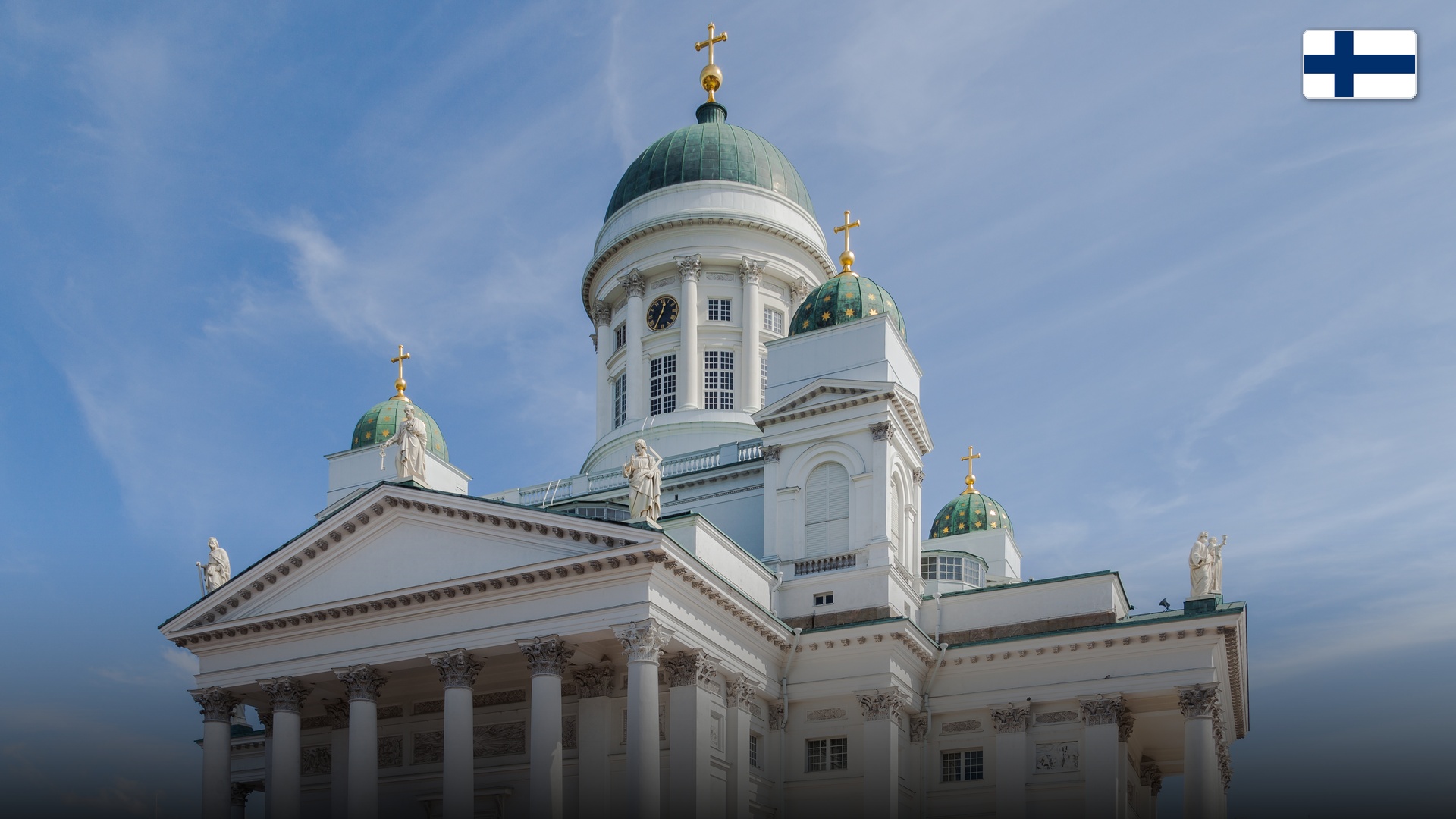 The monumental neoclassical Helsinki Cathedral rising over the expansive Senate Square.