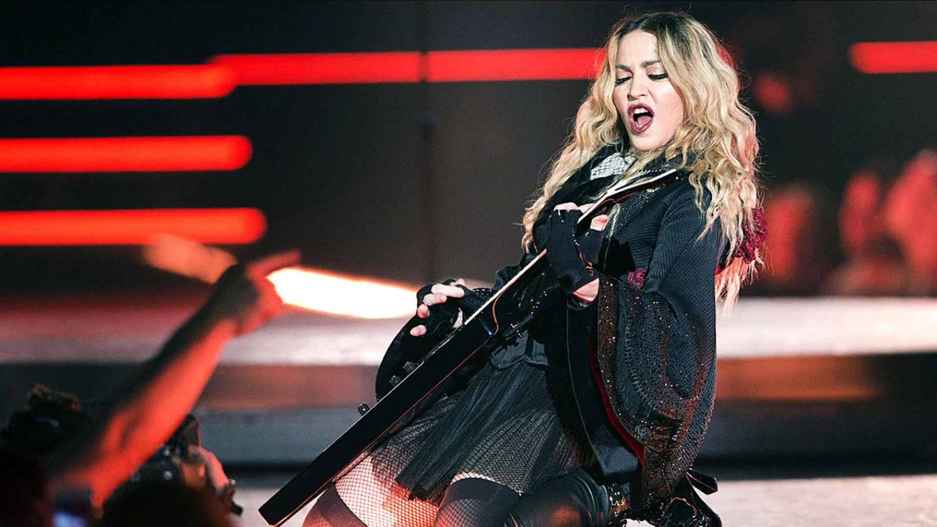 Madonna performing on stage during the Rebel Heart Tour
