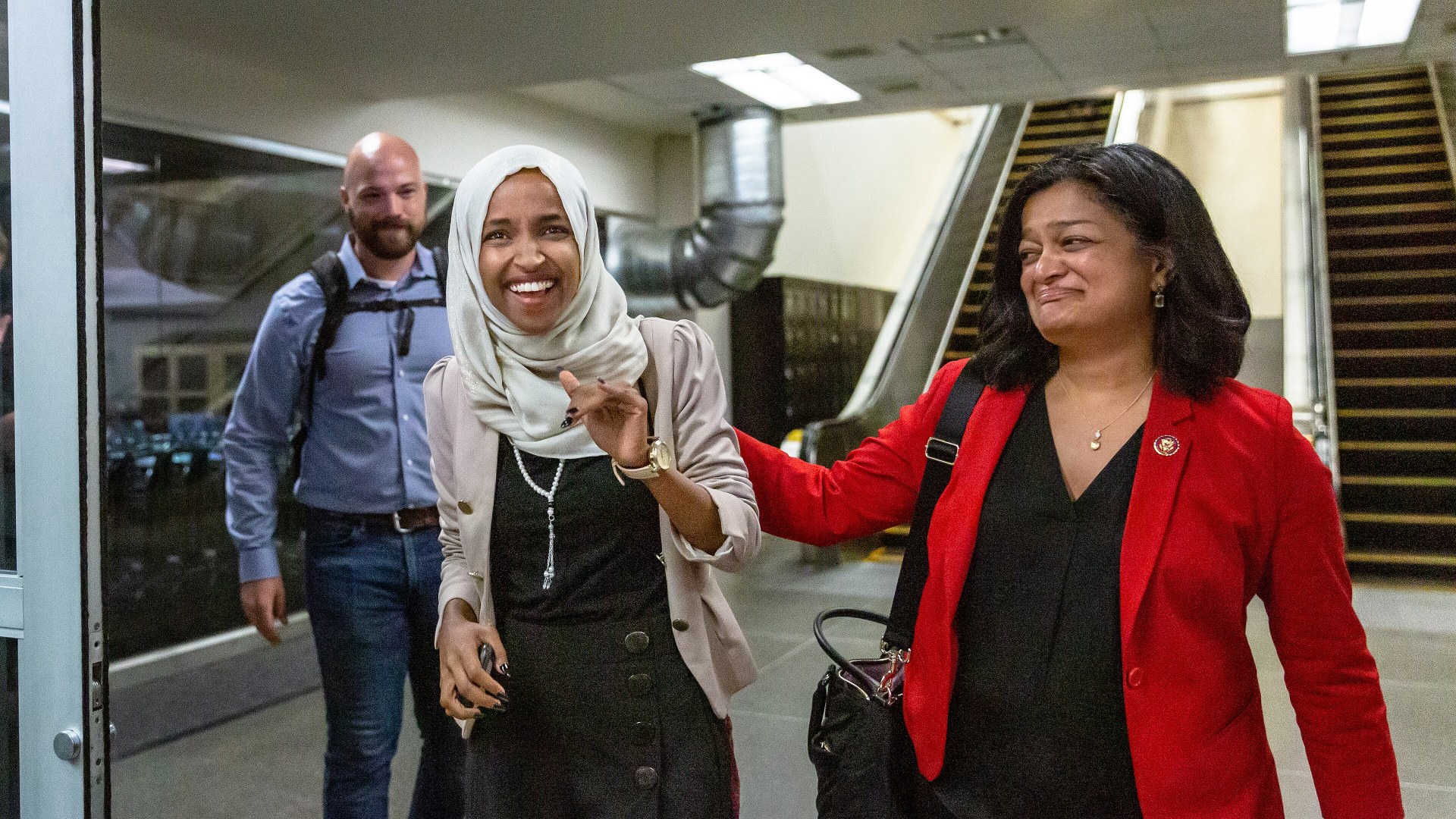 Rep. Ilhan Omar and Rep. Pramila Jayapal arriving at MSP Airport