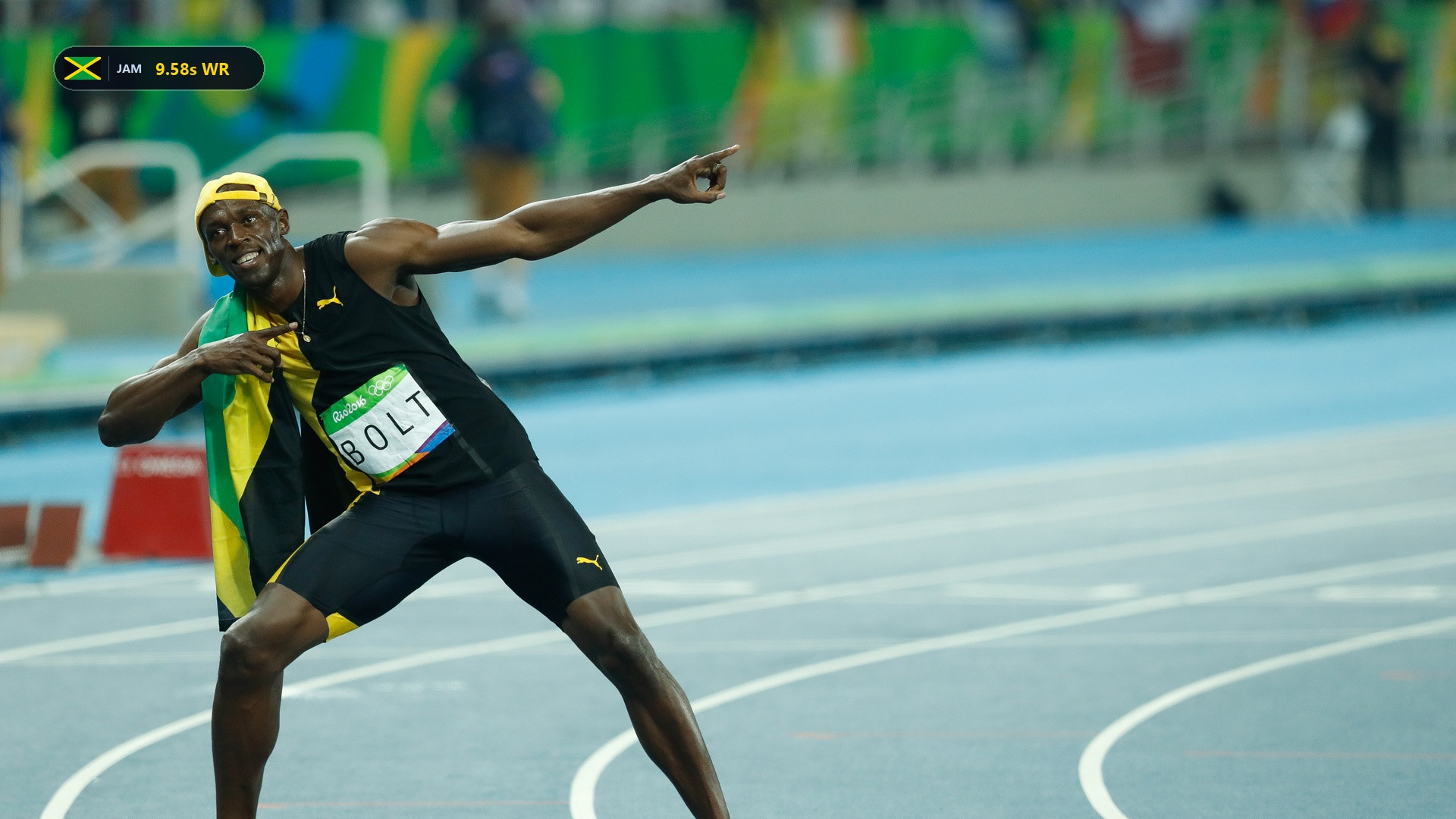 Usain Bolt powering down the Olympic track with intensity in his yellow and black Jamaica singlet.