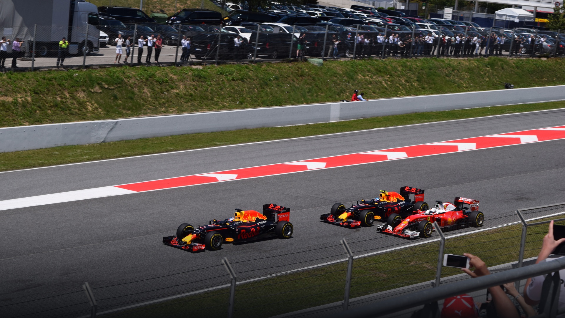 Max Verstappen standing on the top step of the podium in Barcelona after his maiden Formula 1 victory.