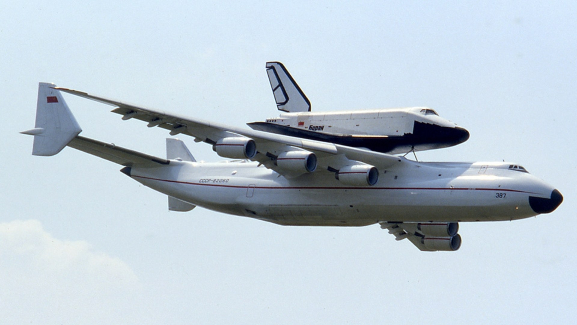 Six-engine Antonov An-225 Mriya flying with the Soviet Buran space shuttle mounted on its back at the 1989 Paris Air Show.