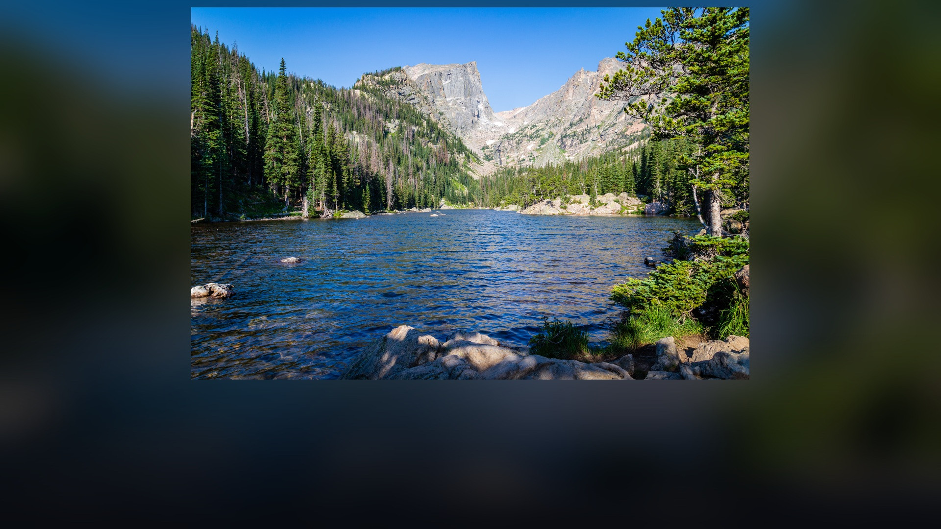 Panoramic landscape vista of Rocky Mountain National Park showing natural geological formations, terrain, and wilderness.