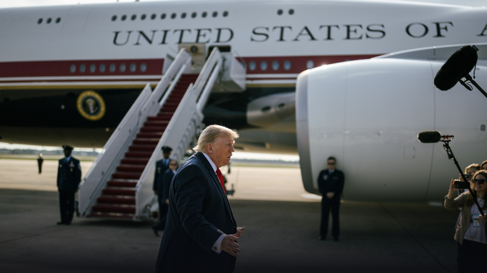 President Donald Trump speaking to reporters in front of Air Force One in 2026.