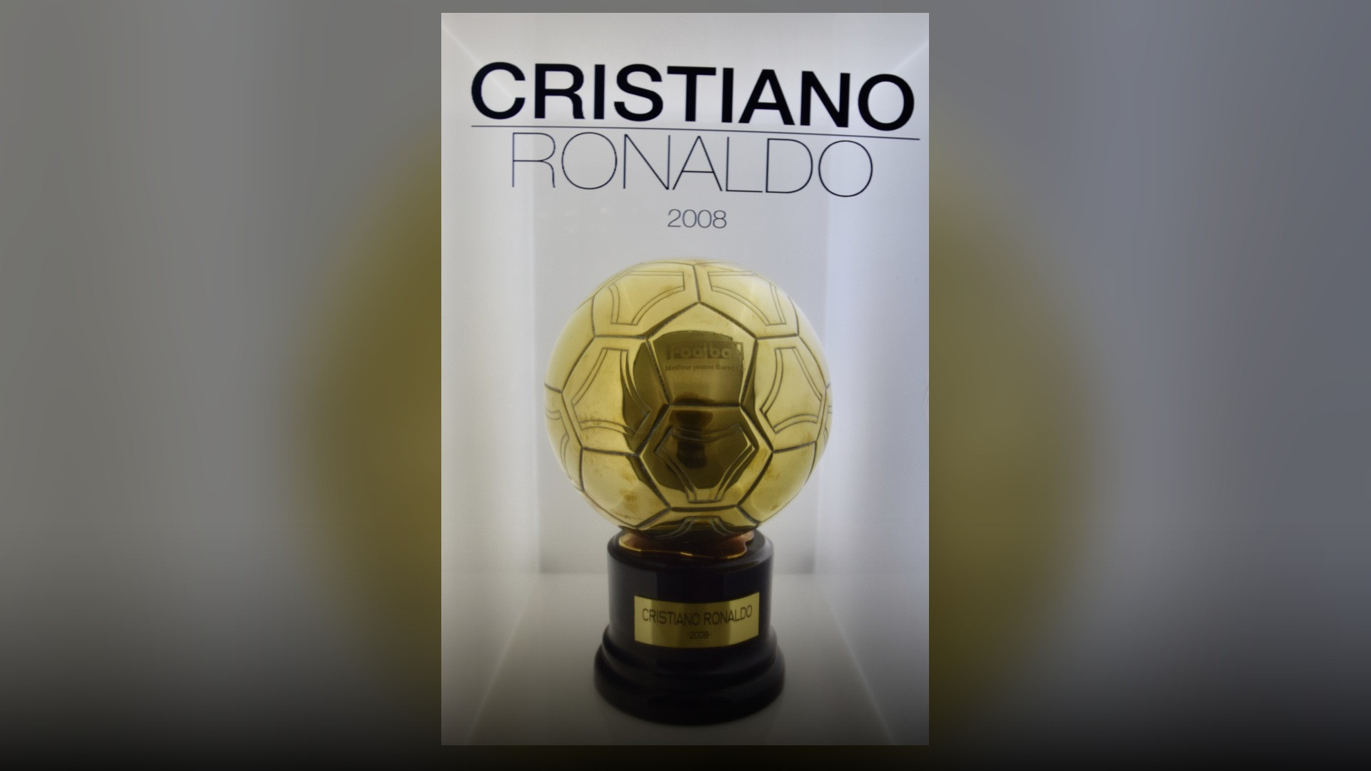 Cristiano Ronaldo's 2008 Ballon d'Or trophy displayed inside the Real Madrid Museum at Santiago Bernabéu.