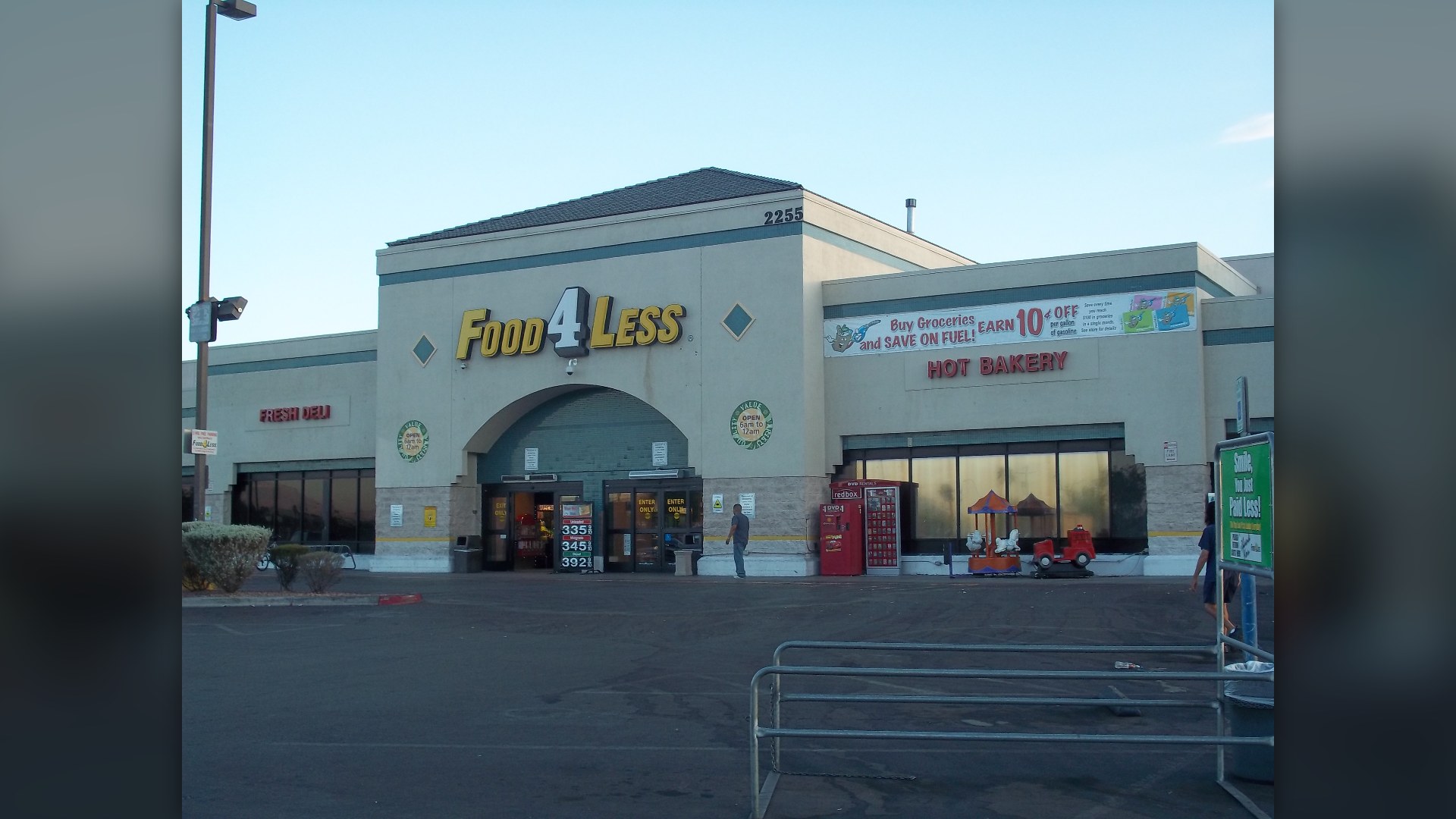 Food 4 Less warehouse-style grocery store exterior in North Las Vegas, Nevada, representing Kroger's discount grocery chain at #12.