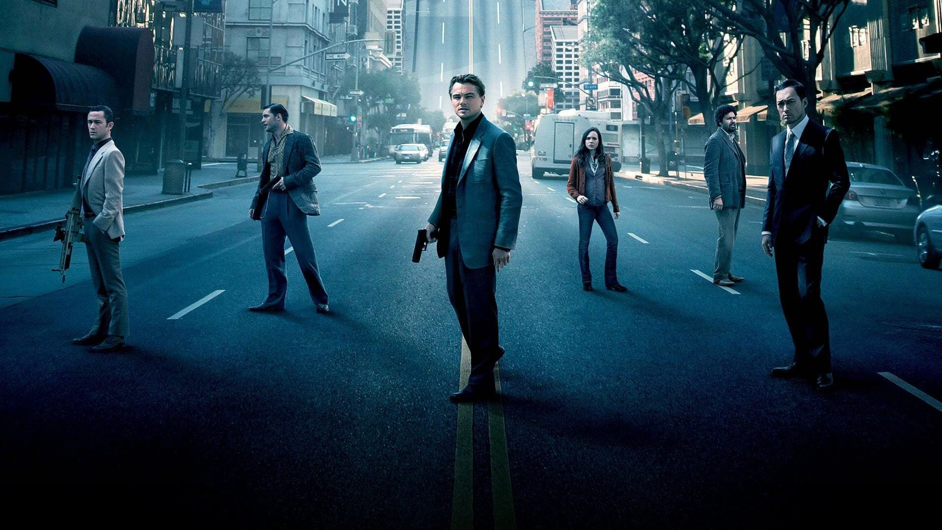 A Paris street folds dramatically upward into the sky during a dream architecture sequence in Inception.