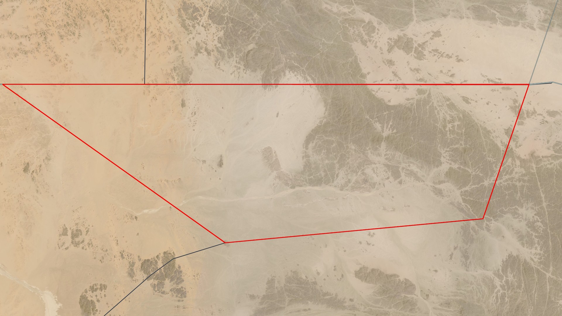 Landsat 8 satellite landscape image showing the trapezoid border of Bir Tawil in the Nubian Desert between Egypt and Sudan.