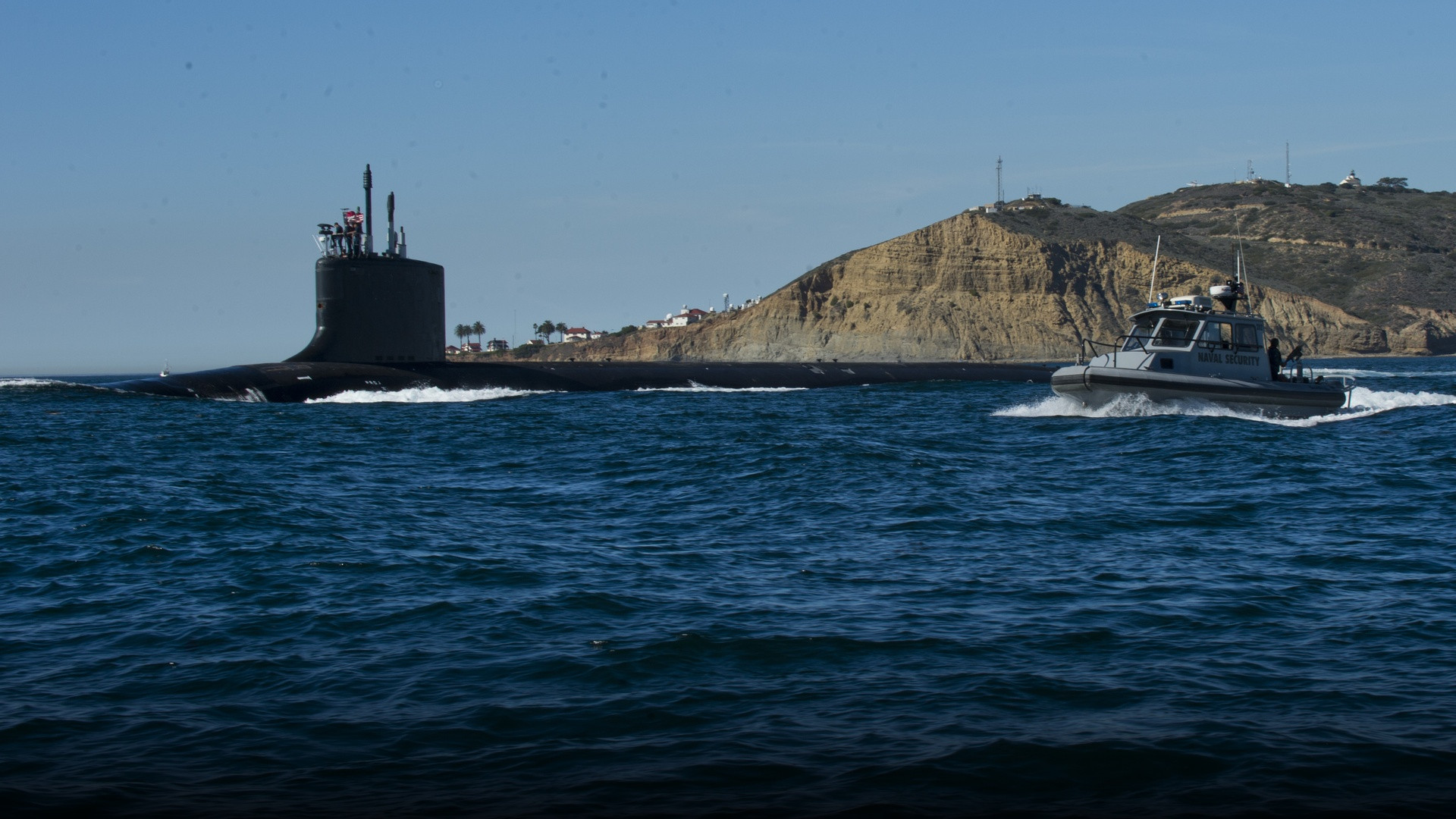 Virginia-class fast-attack submarine surfaced and underway departing San Diego.