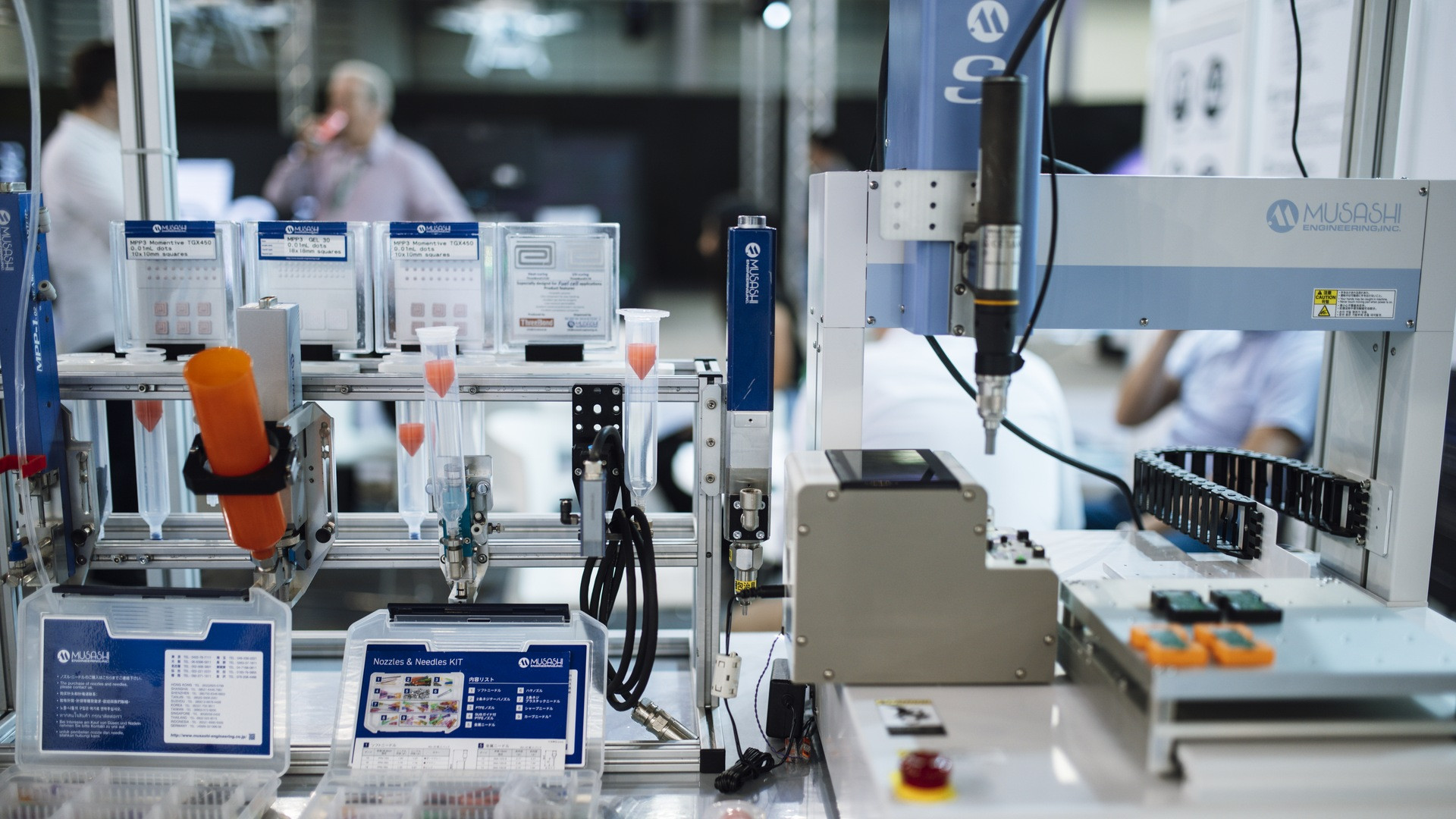Precision multi-axis industrial robotic arm performing high-speed automated laboratory operations.