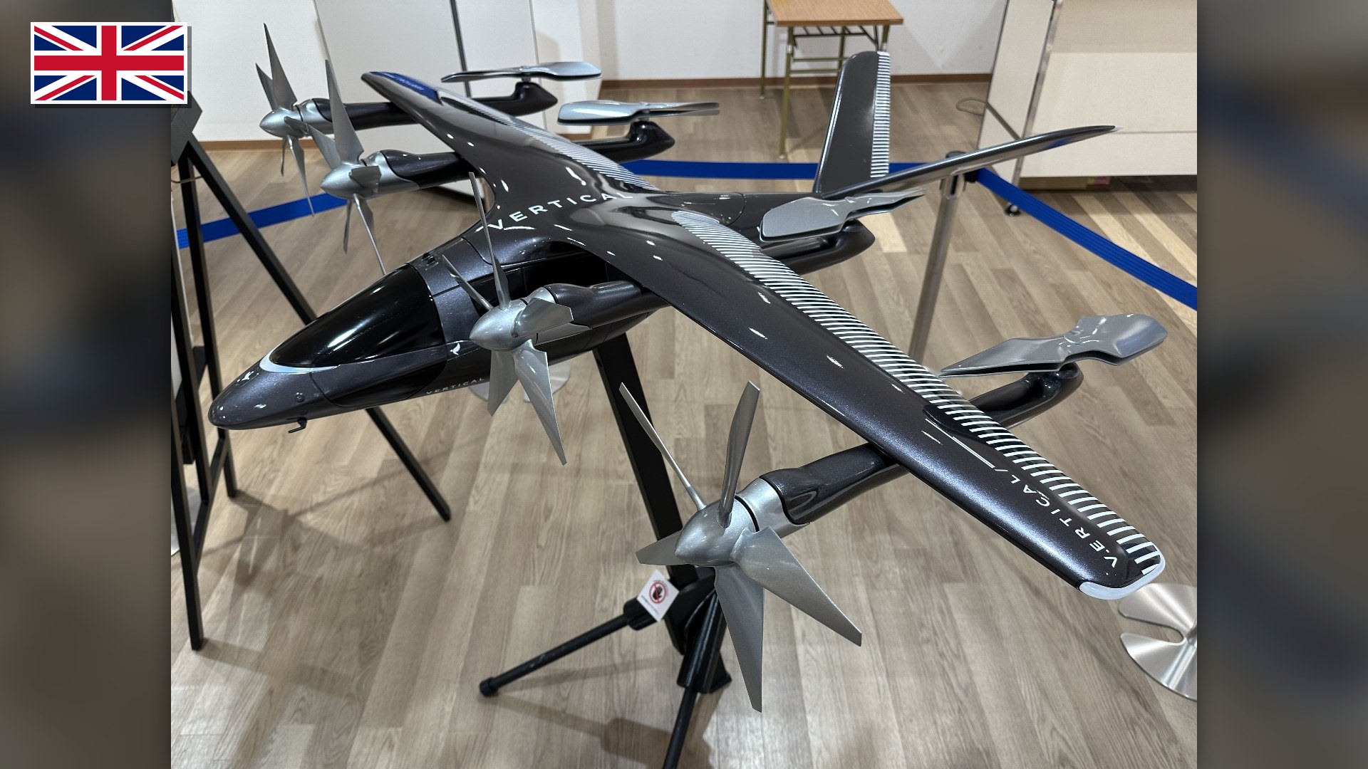 Vertical Aerospace VX4 British tilt-rotor eVTOL aircraft with the flag of the United Kingdom in the top-left corner.
