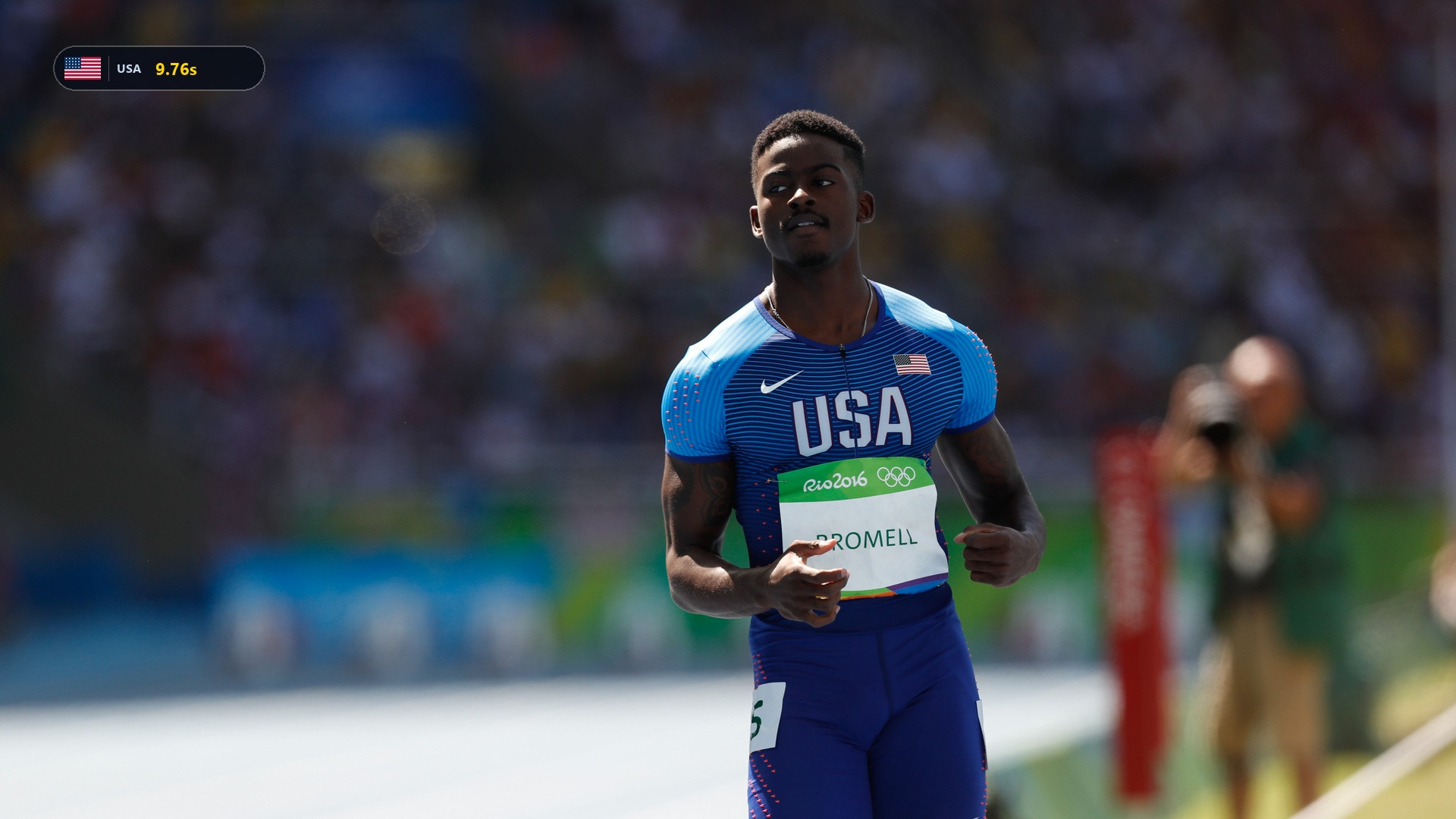 Trayvon Bromell sprinting forward with focus and determination.