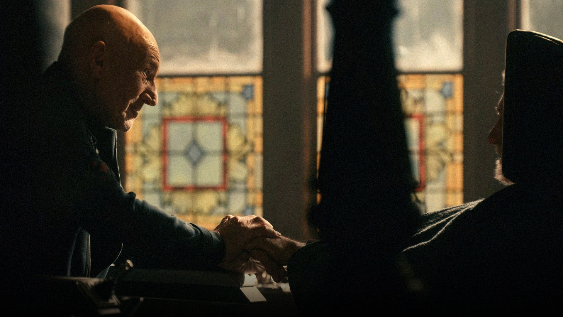 Patrick Stewart as Professor Charles Xavier in the yellow hoverchair.