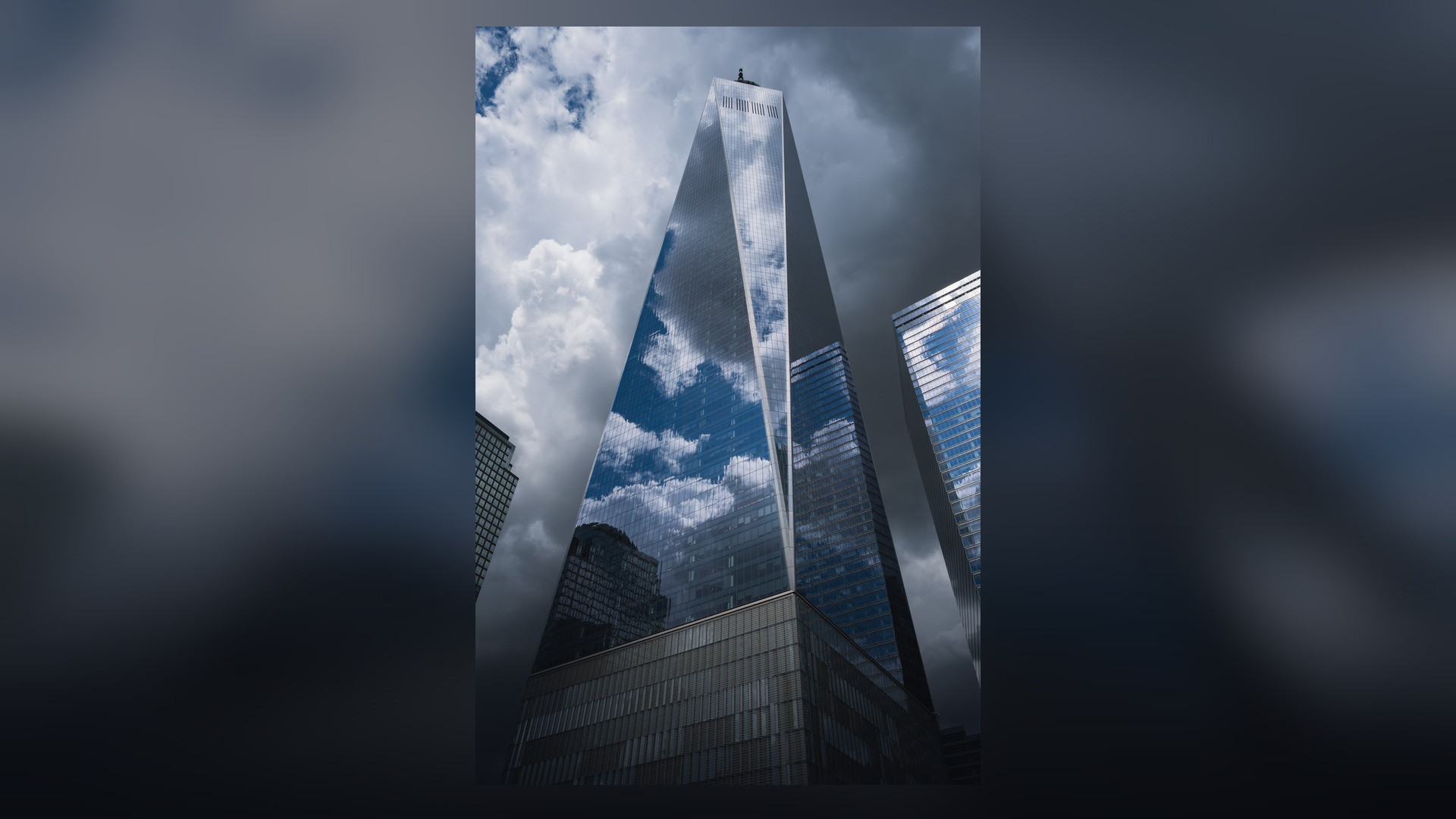 One World Trade Center soaring with its dramatic spire above Lower Manhattan.