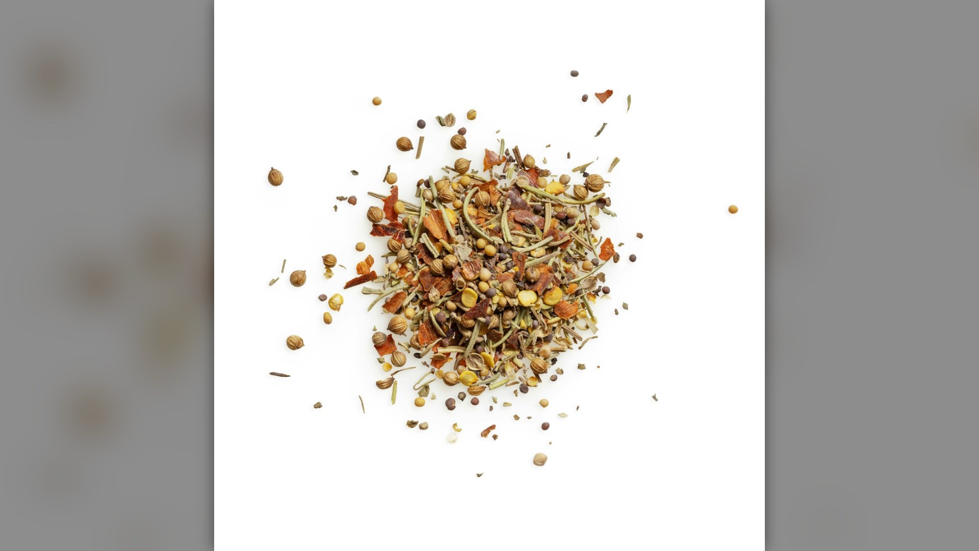 Bright orange turmeric powder in a bowl