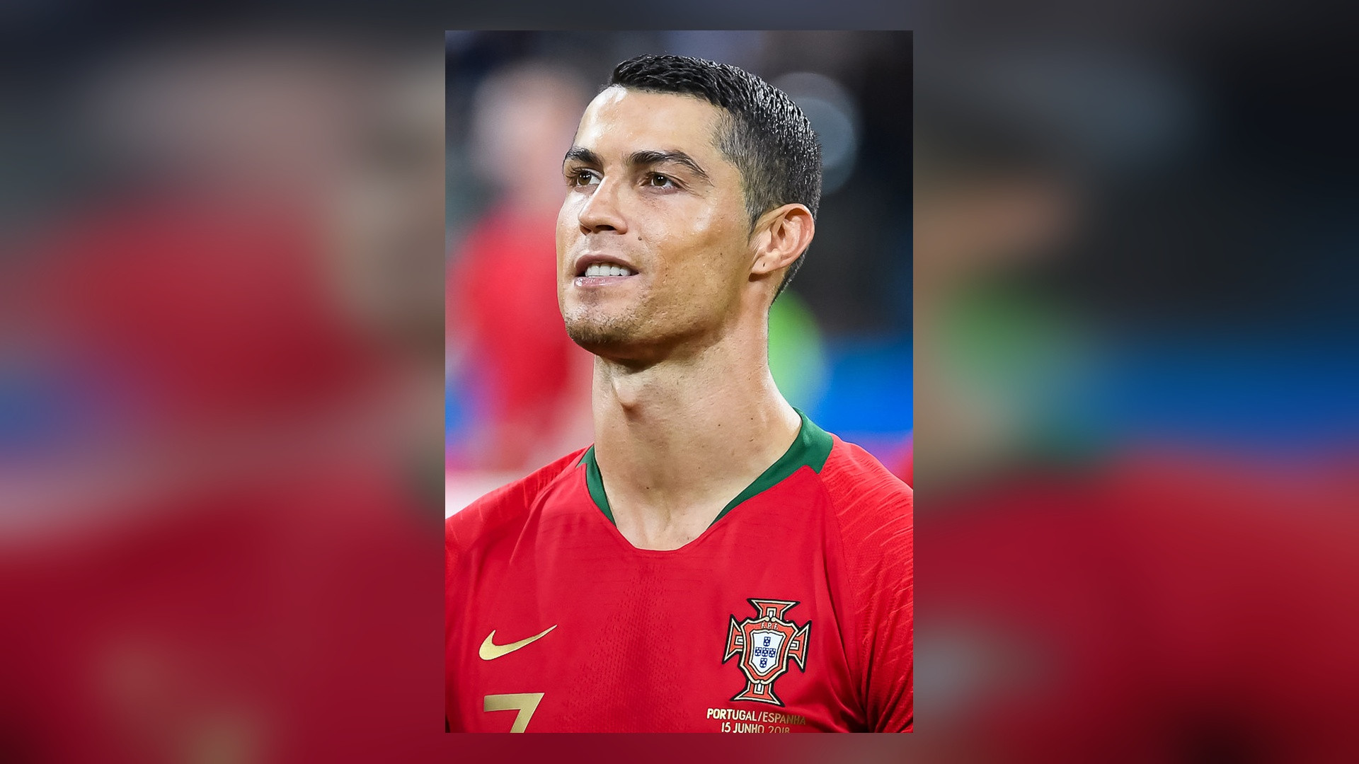 Cristiano Ronaldo looking forward in red Portugal kit.
