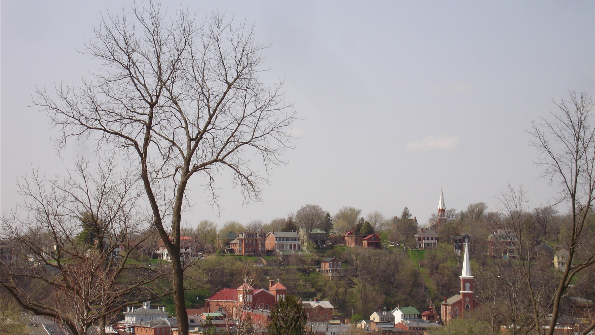 Historic 19th-century brick buildings and church spires in the Galena Historic District, Illinois