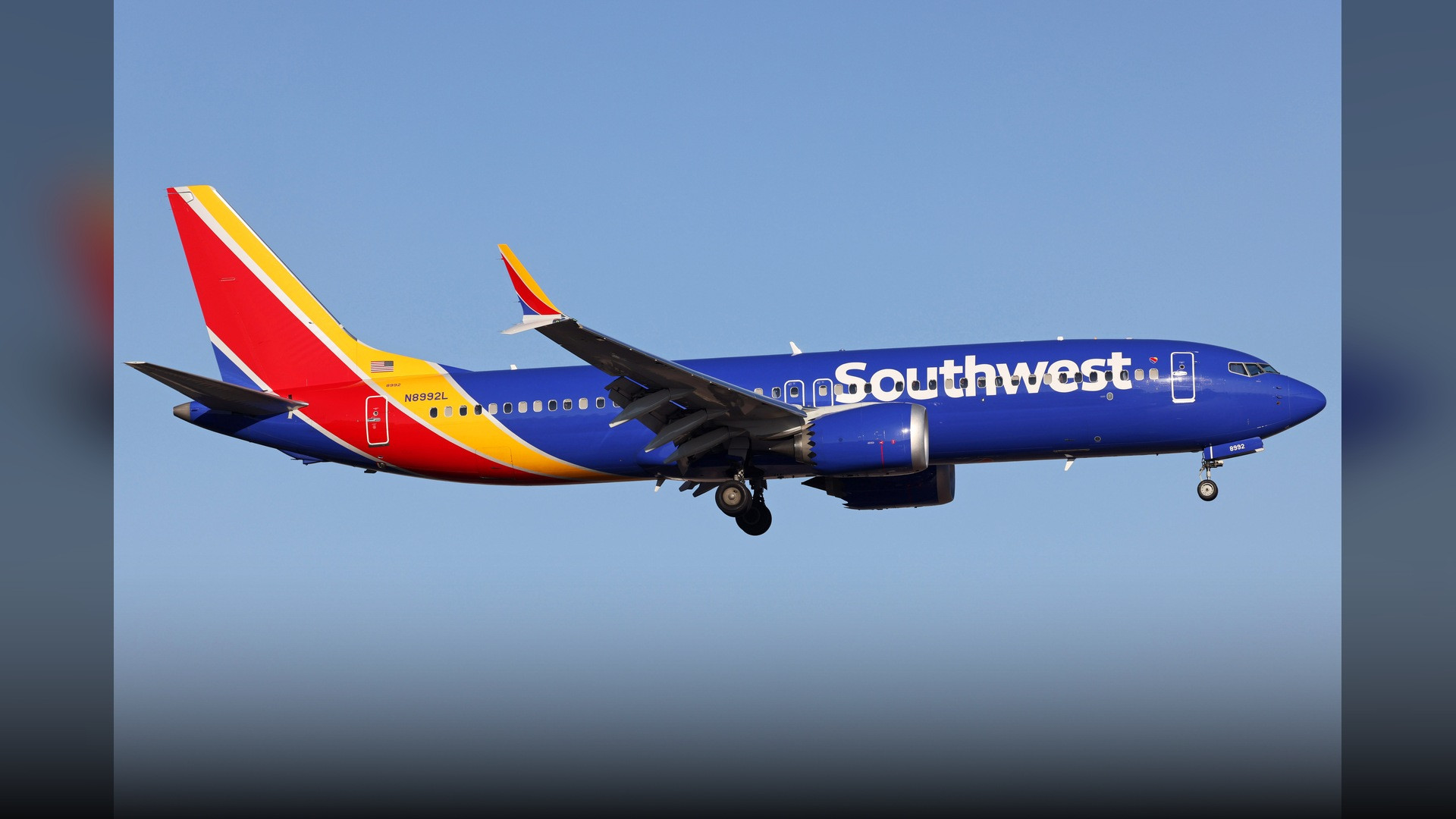 A Southwest Airlines Boeing 737 MAX commercial aircraft taxiing across the tarmac at Harry Reid International Airport in Las Vegas.