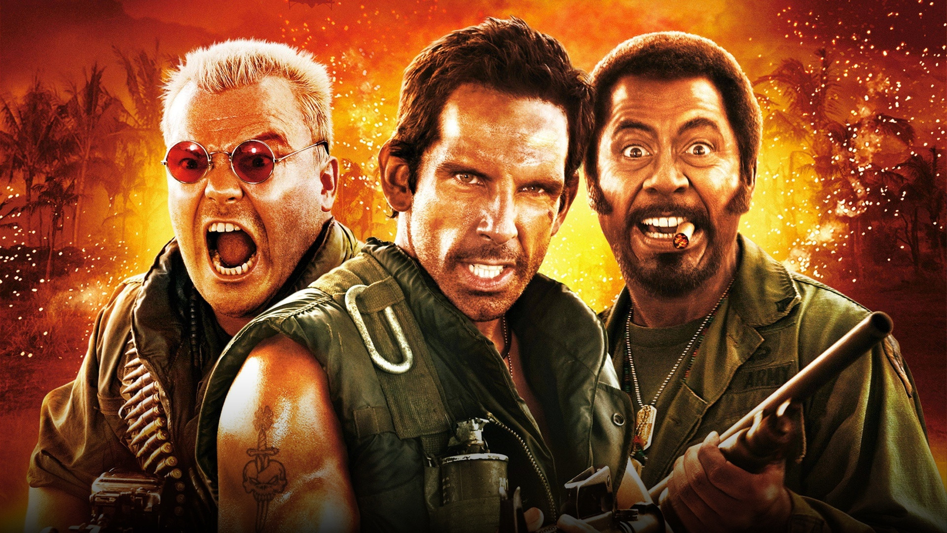 Robert Downey Jr. in heavy method actor makeup as Kirk Lazarus alongside Ben Stiller and Jack Black in the Vietnam jungle in Tropic Thunder.