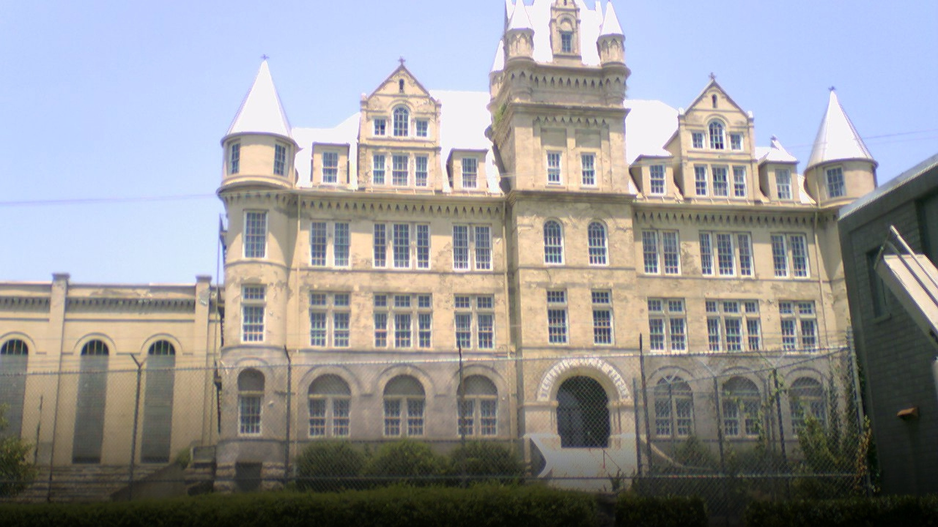 The imposing stone main entrance and fortress battlements of Tennessee State Prison in Nashville.