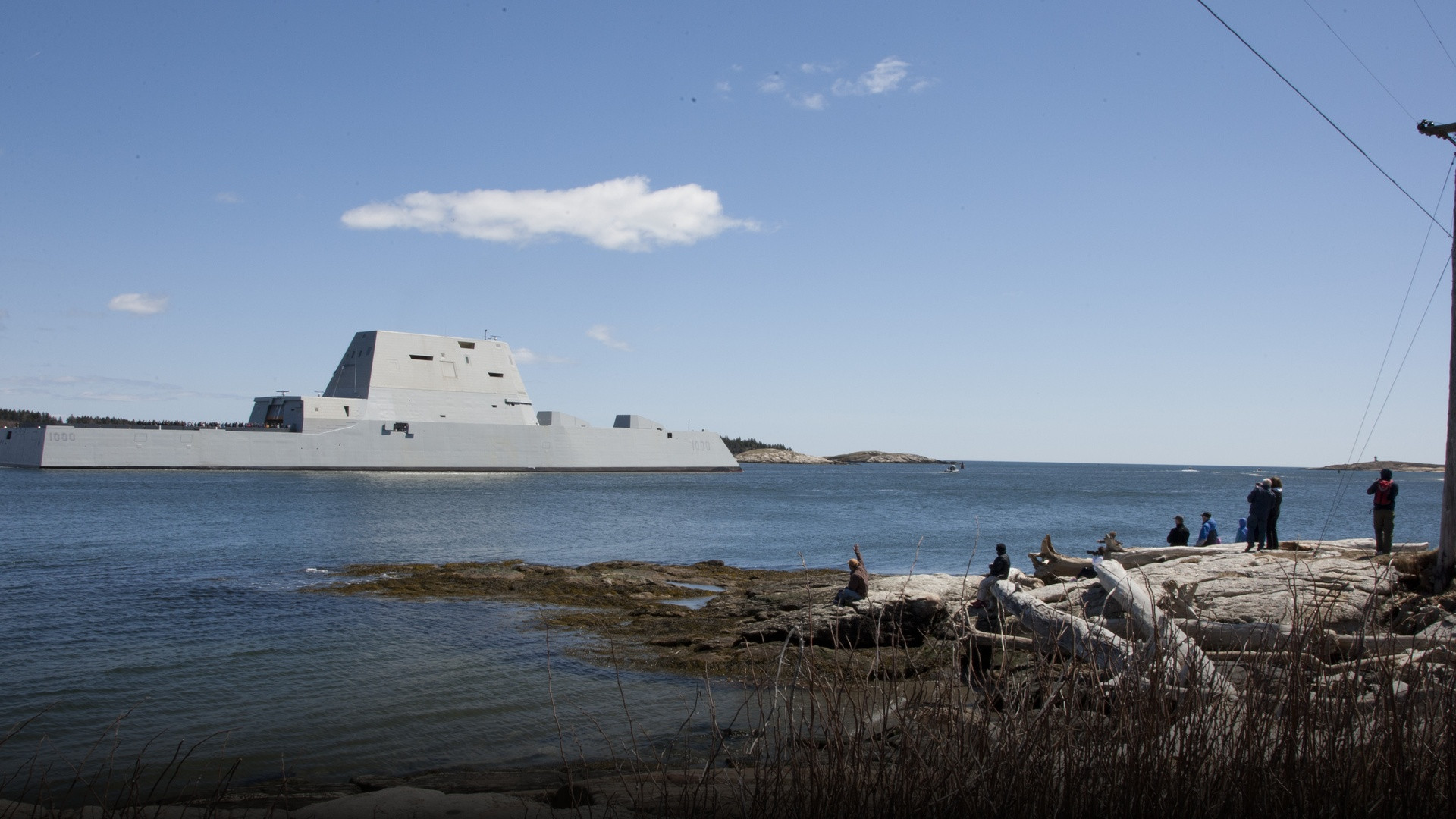 Stealth guided-missile destroyer USS Zumwalt DDG-1000 underway departing Bath Maine for acceptance trials.