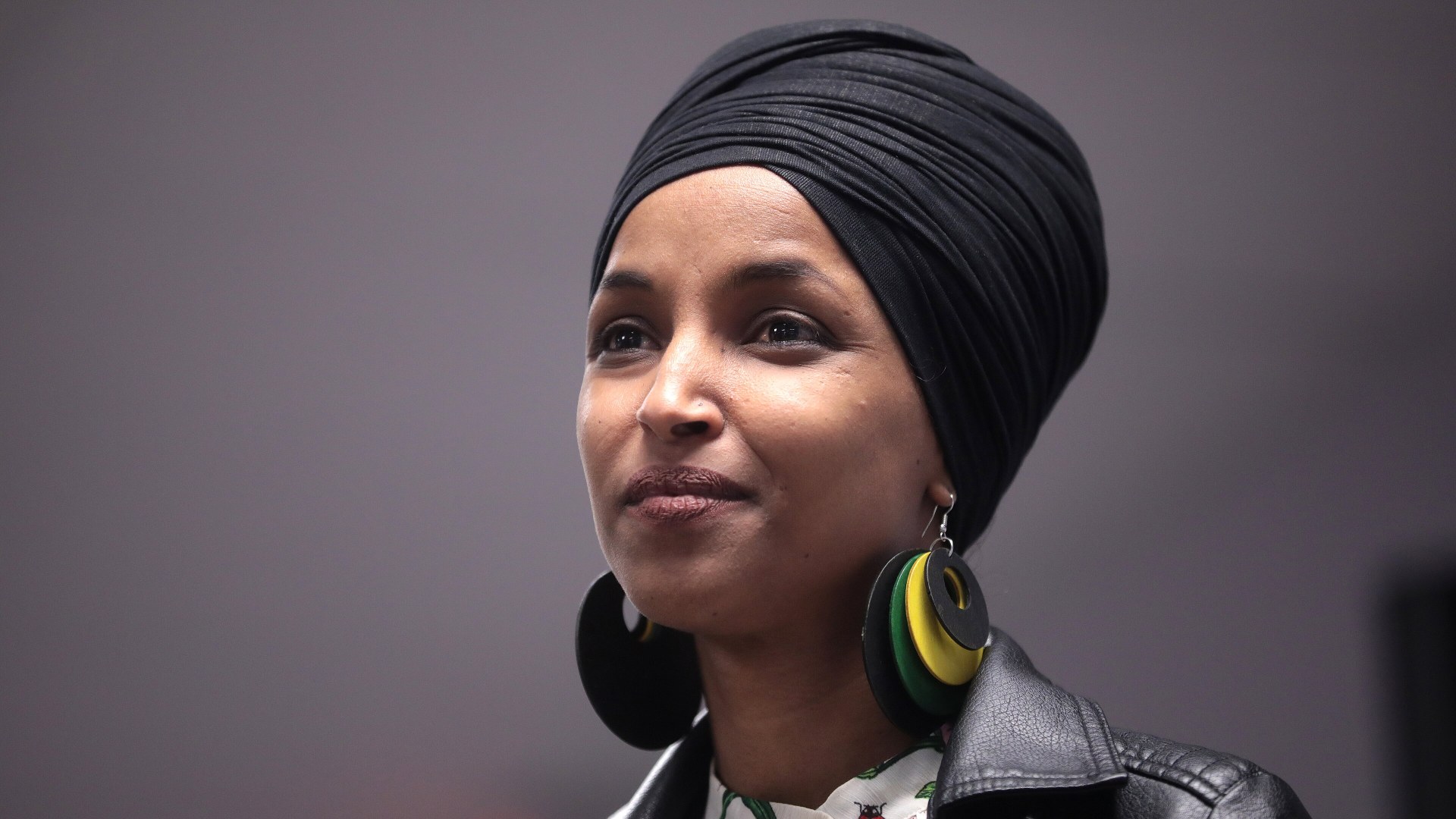 Close-up portrait of Rep. Ilhan Omar at a public forum