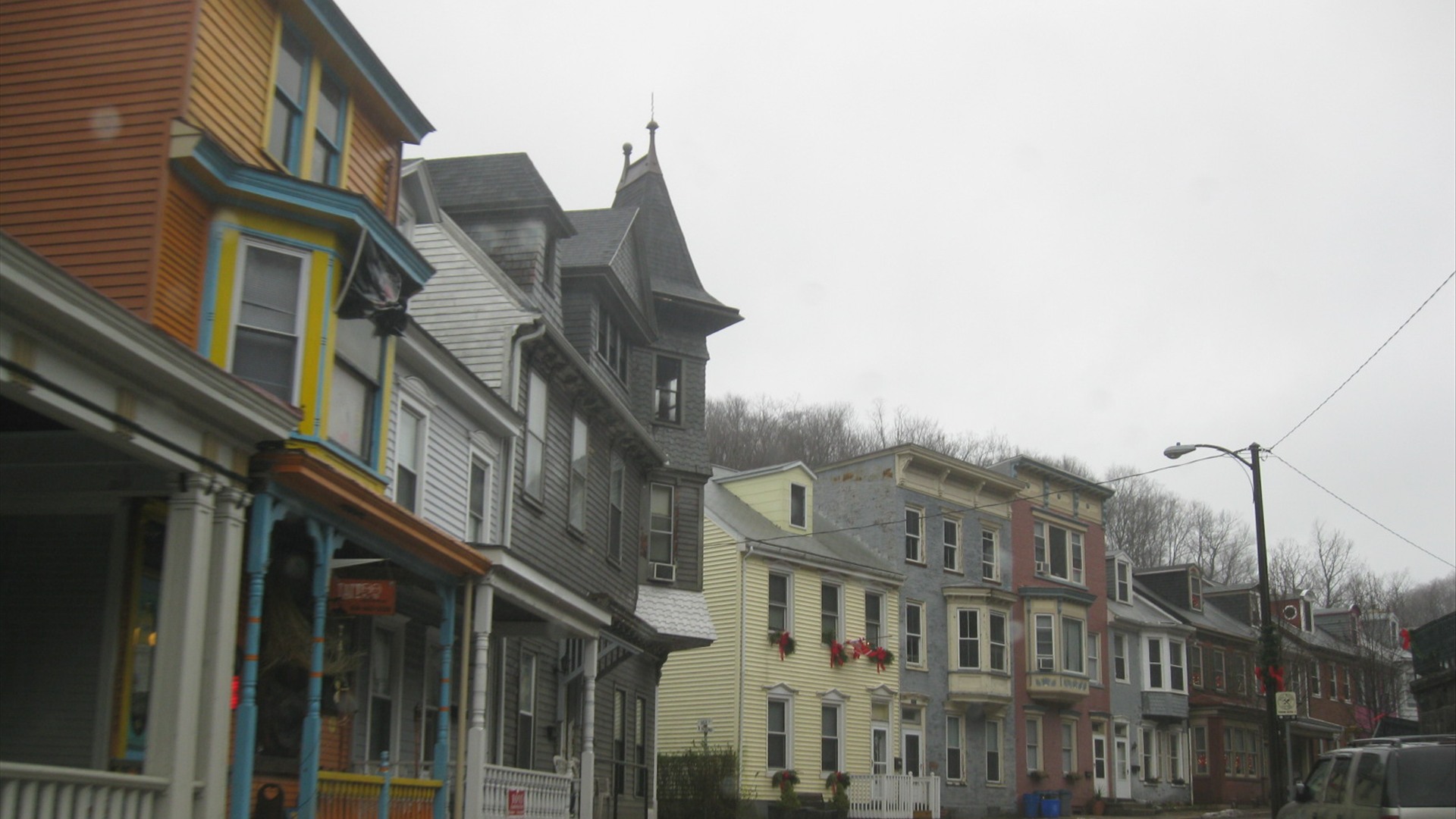 Colorful Victorian rowhouses along a steep street in Jim Thorpe, Pennsylvania