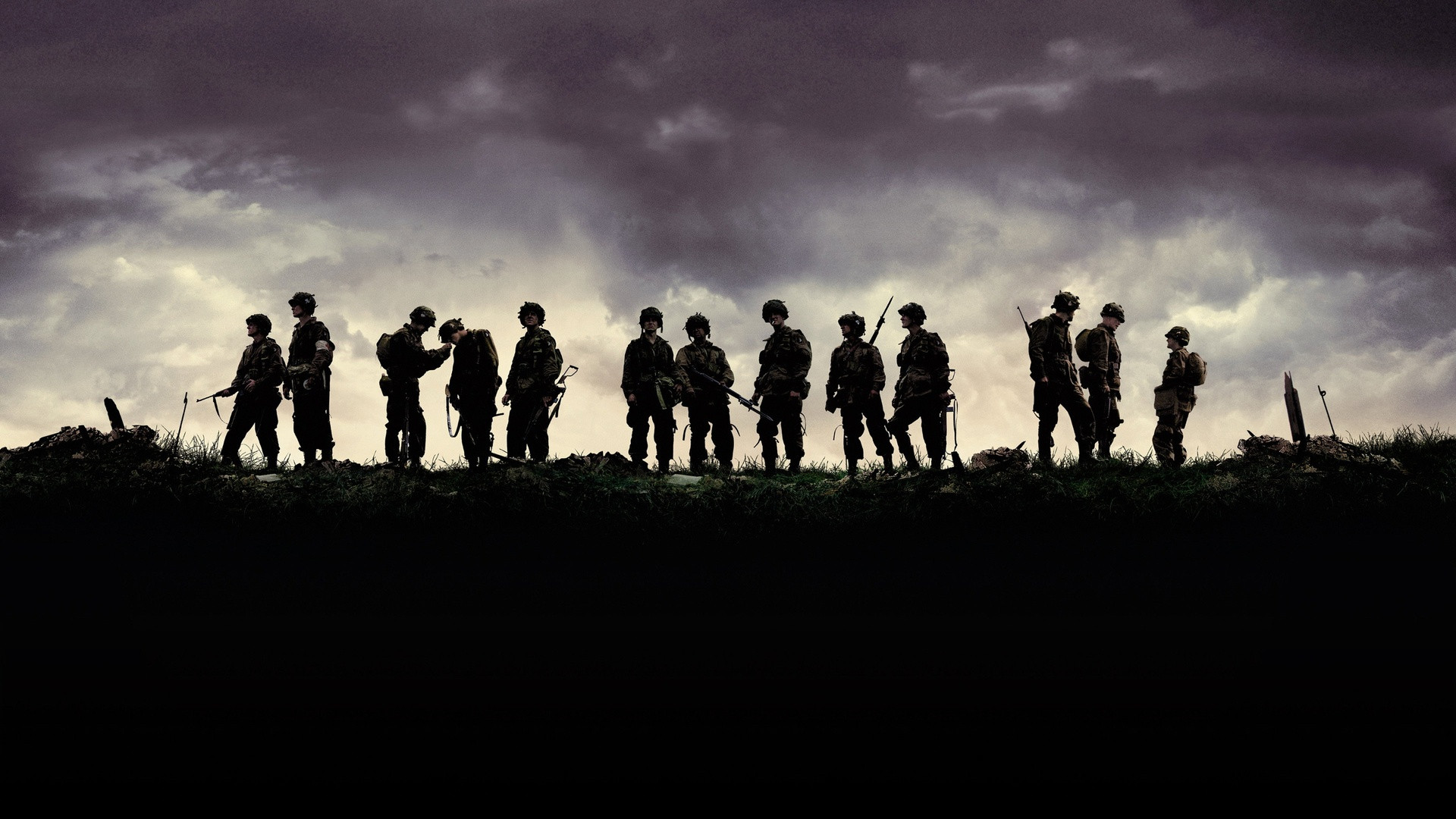 Easy Company paratroopers silhouetted on a European battlefield ridge in Band of Brothers