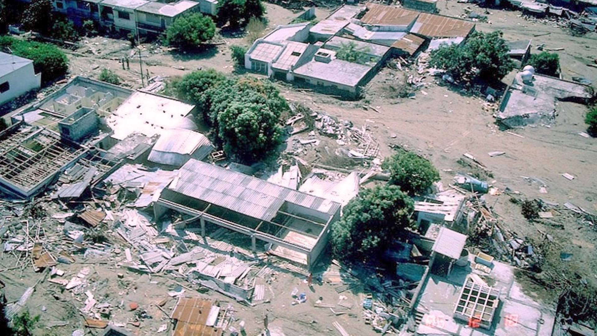 Aerial photograph of volcanic mudflow lahars covering the destroyed town of Armero, Colombia, in November 1985.