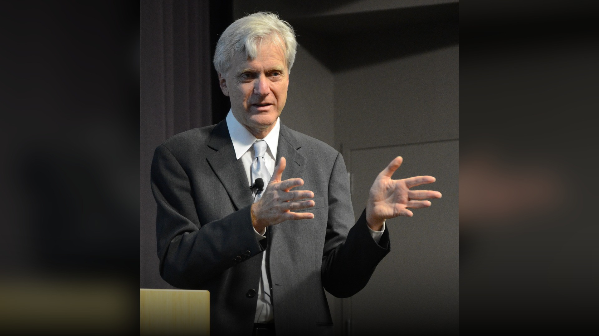 Andreas von Bechtolsheim holding a high-speed networking microchip.