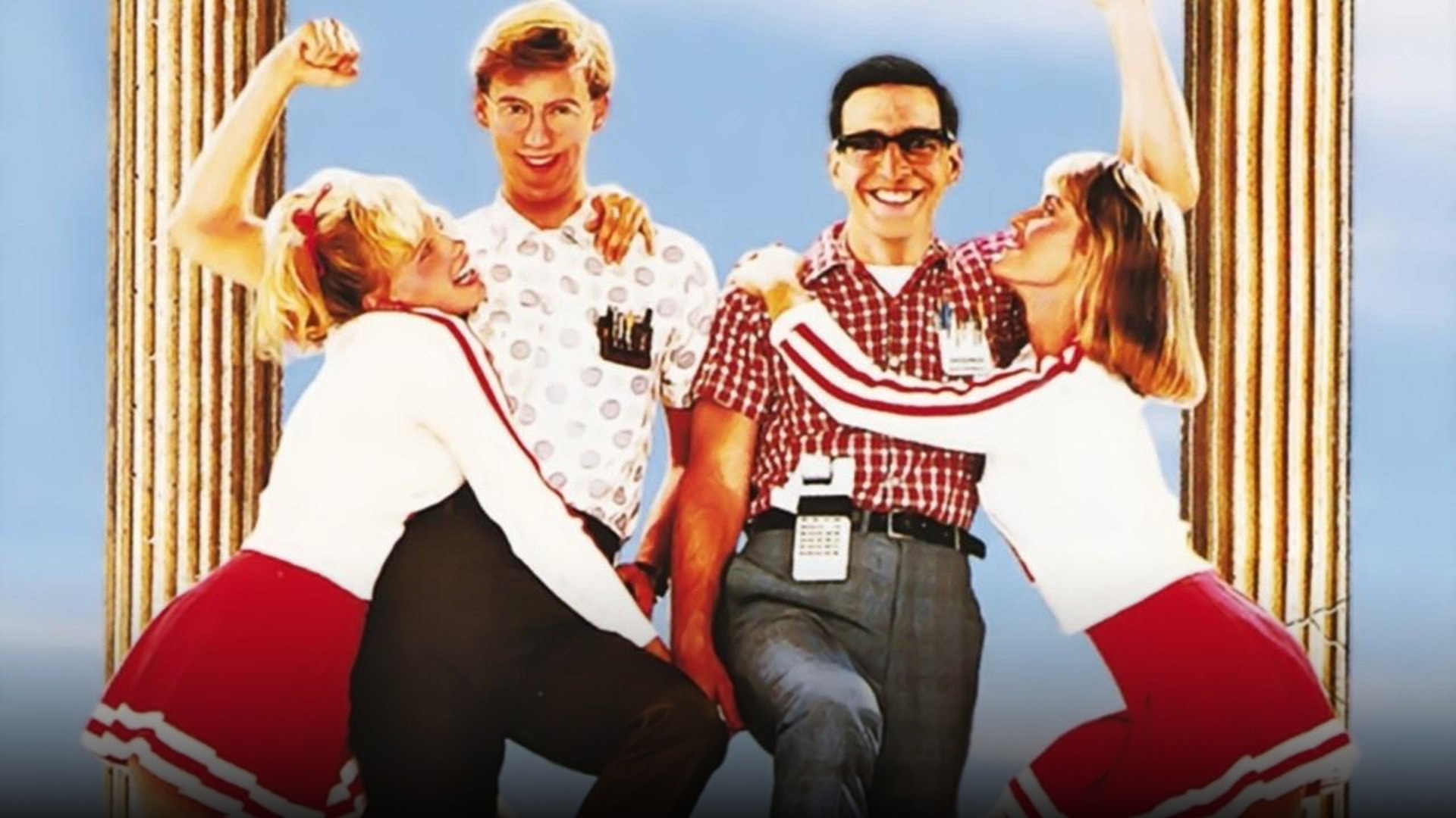 Robert Carradine as Lewis Skolnick and Anthony Edwards as Gilbert Lowe posing with pocket protectors in Revenge of the Nerds.