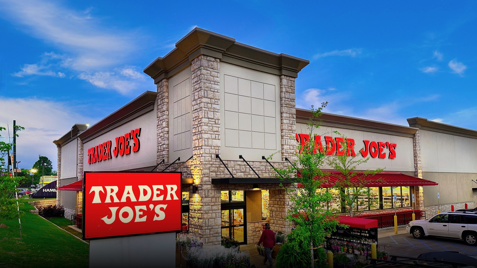 Photograph of Trader Joe's supermarket storefront celebrating family grocery excellence.